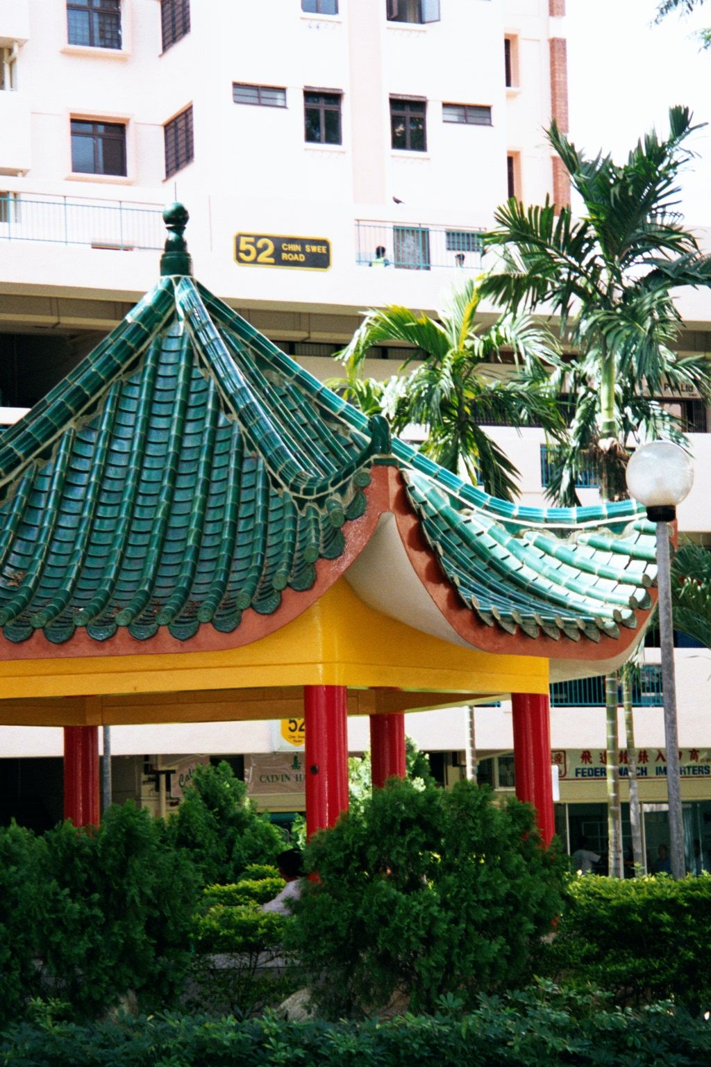 In the midst of a sea of Chinatown residential blocks: a kiosk straight from the Ethnic Decor Department at Home Depot.