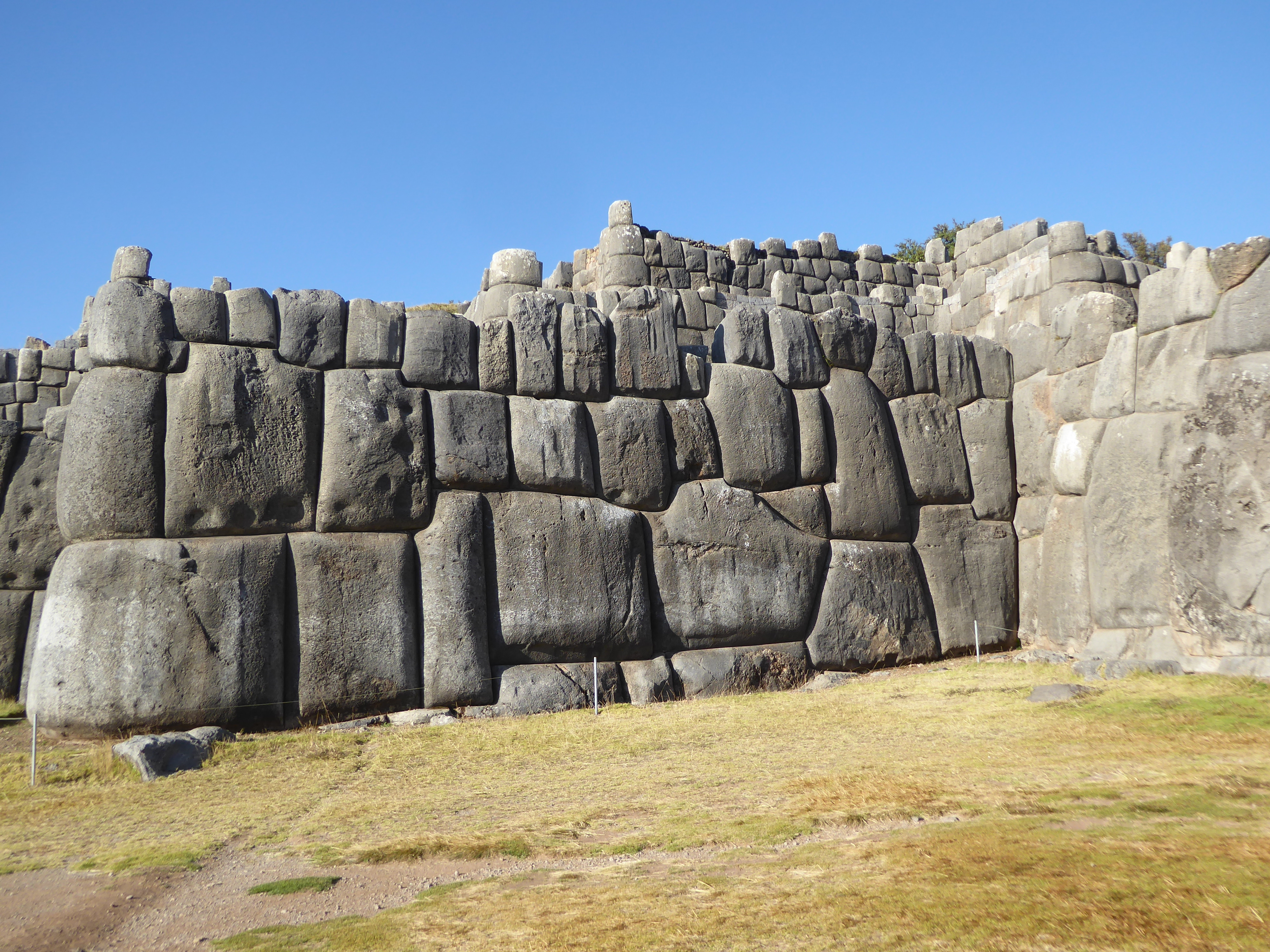 We're back to cyclopean or megalithic masonry.

How did the Inca do it without wheels or rollers, without the means to cut stone, and with n