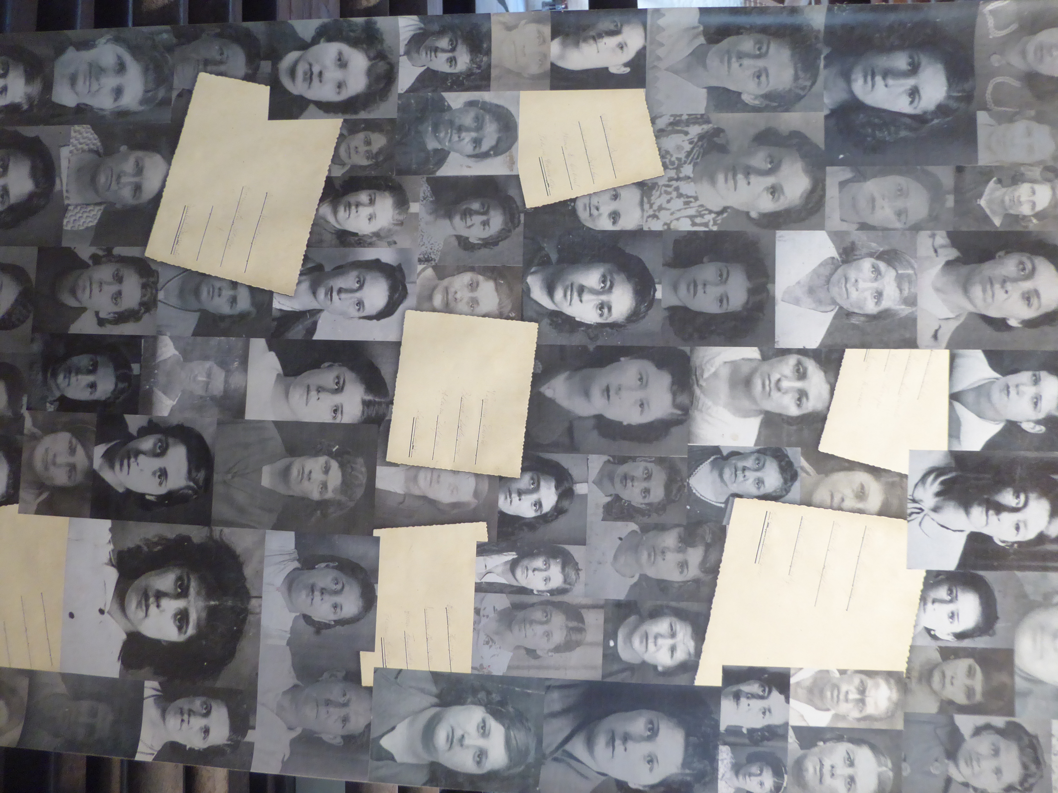 A grim mosaic of ID photos. The plant at its peak had 5,000 workers. Labor strife was minimal because there was an infinite supply of willin