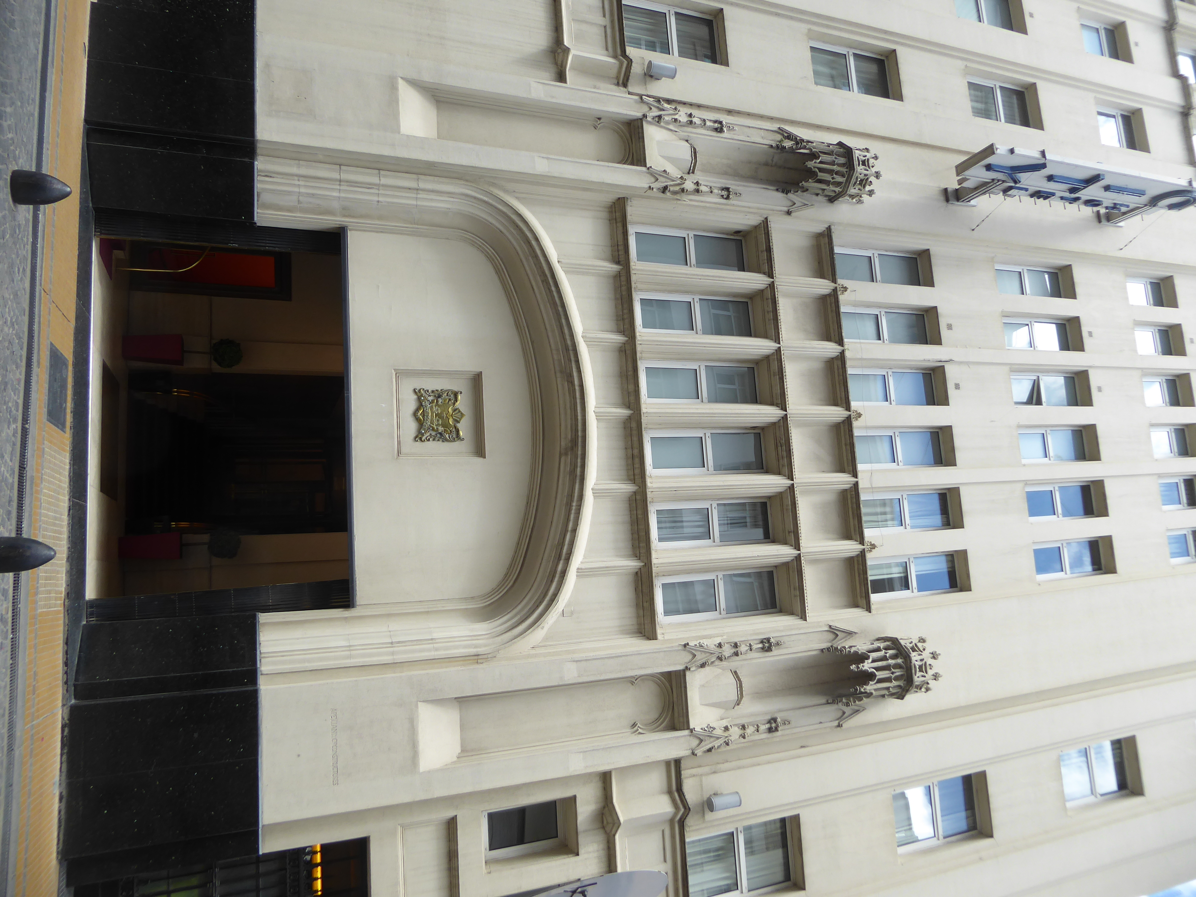 The confusion extends to a cunning blend of Art Deco and Neo-Gothic. The entrance suggests a blade ready to drop.