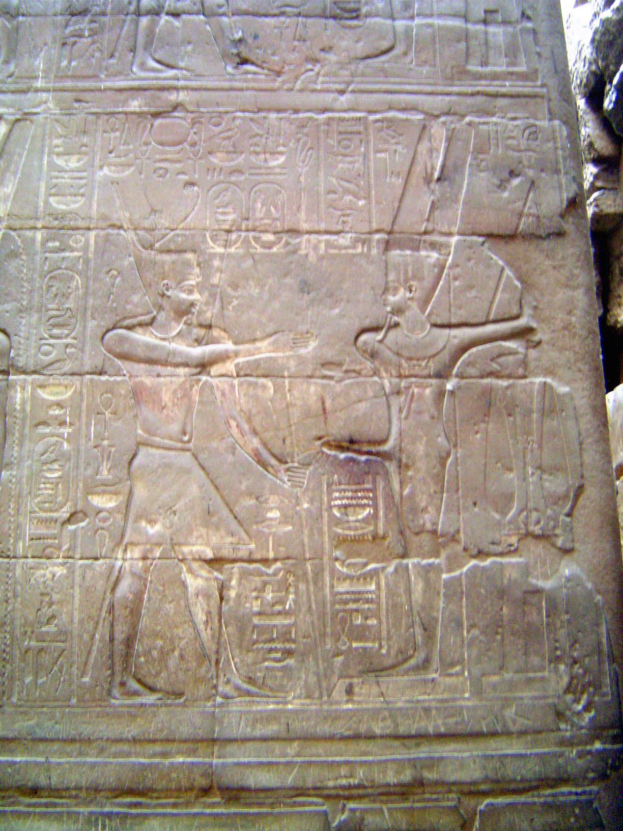 On the walls are several images of Amenhotep III standing before the omnipotent ithyphallic Amen.