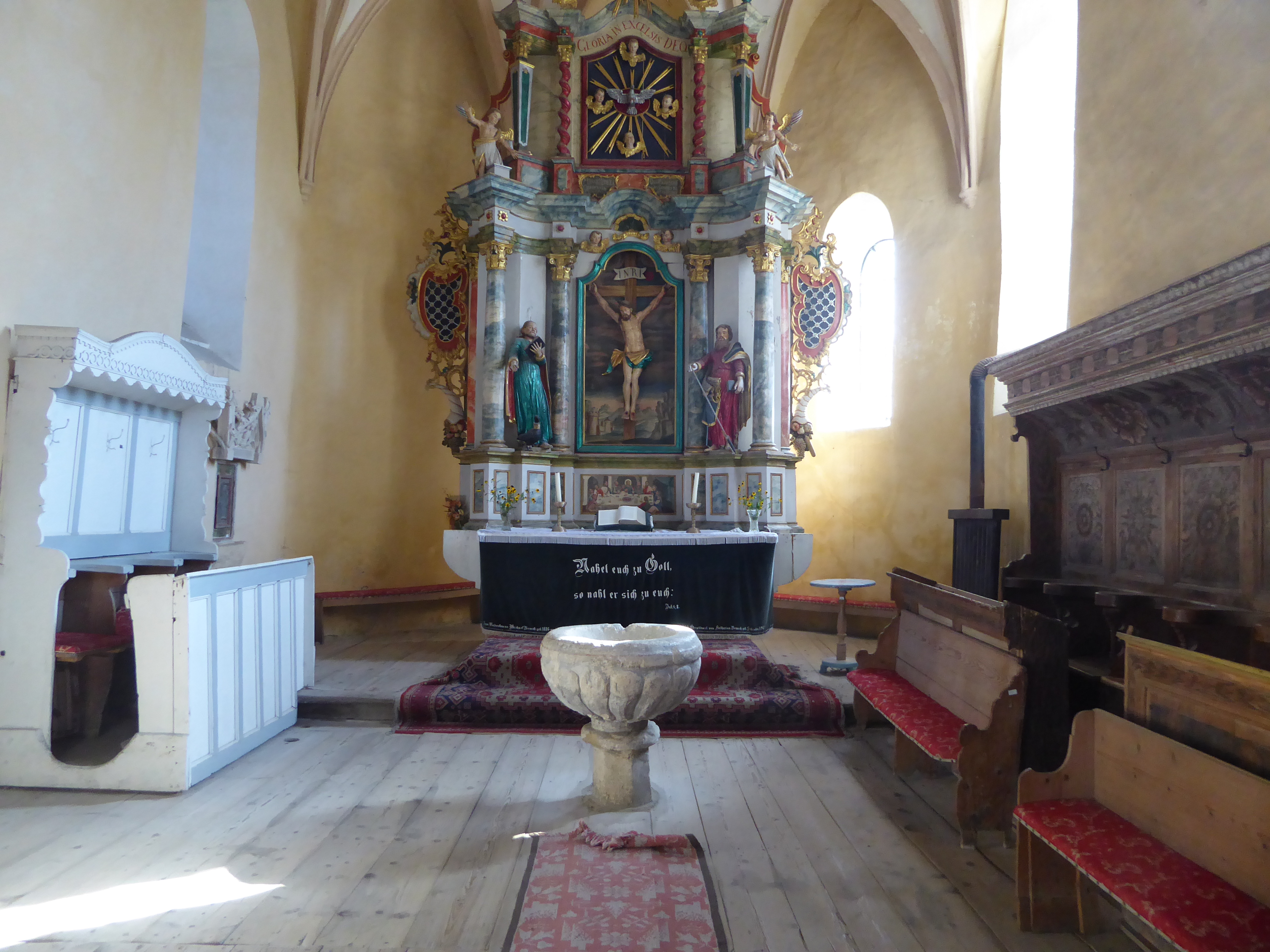 There are a few other fine touches, including the font and the choir stalls on the right.