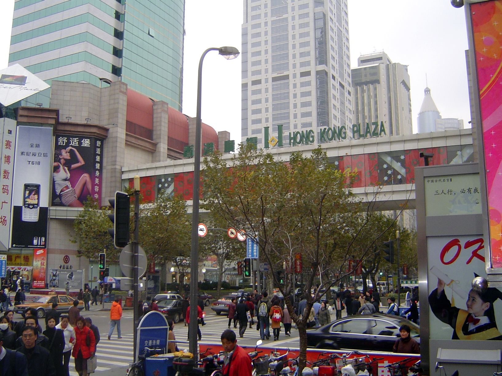 Streetside, busy shoppers.