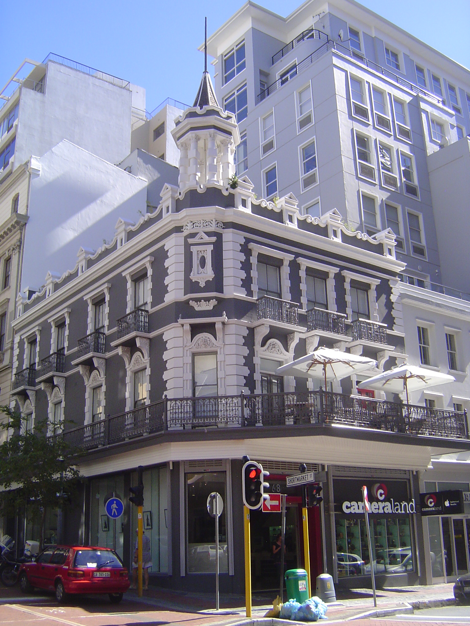 A near copy, this was formerly Shap's Central Pharmacy. The ornamental details were added in 1900 by William Black, but those on the ground