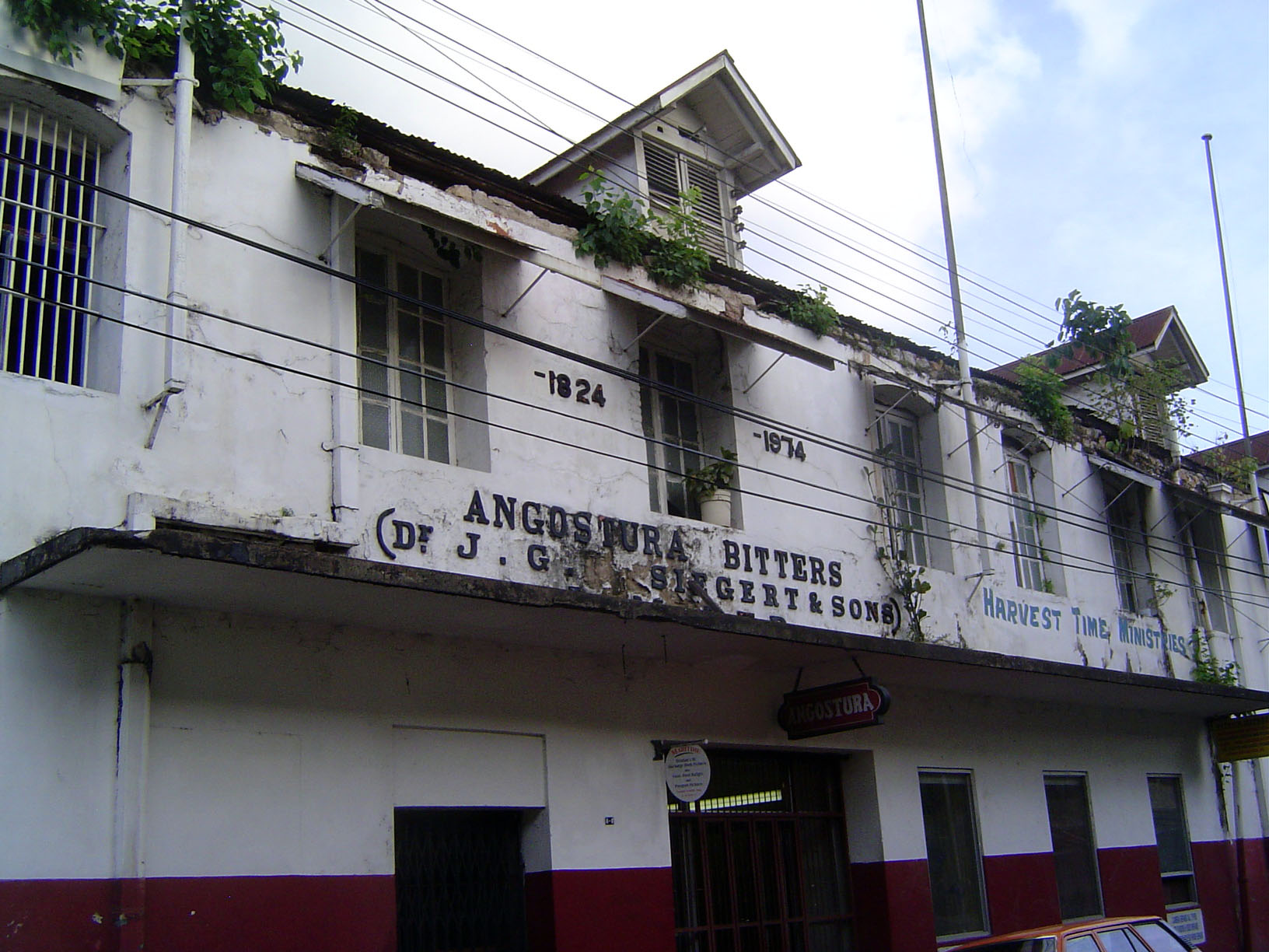 Nearby, the old building of Angostura Bitters, a company with a long history on Trinidad.