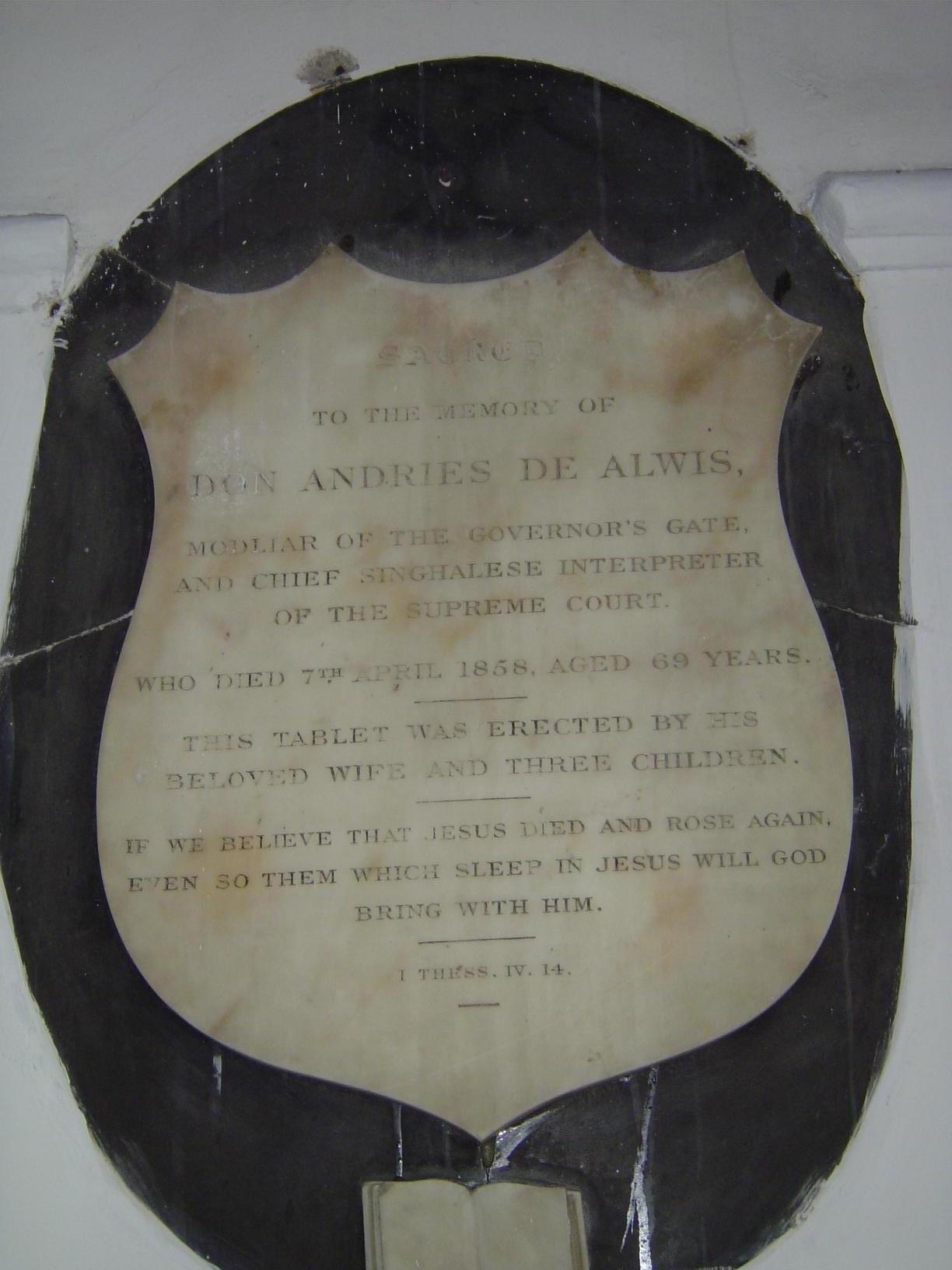 On the church wall, a memorial to a court functionary, the chief Sinhala interpreter.