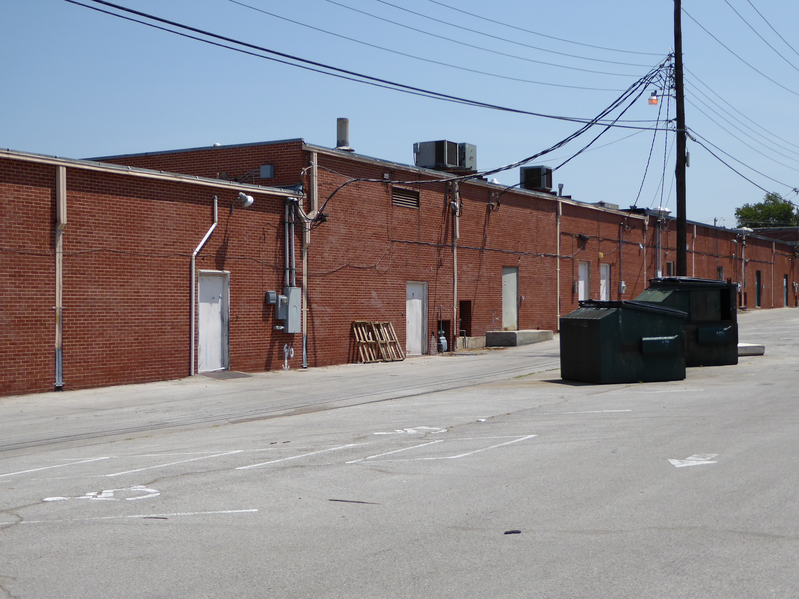 The back of the shopping center remains almost untouched from its earliest days.