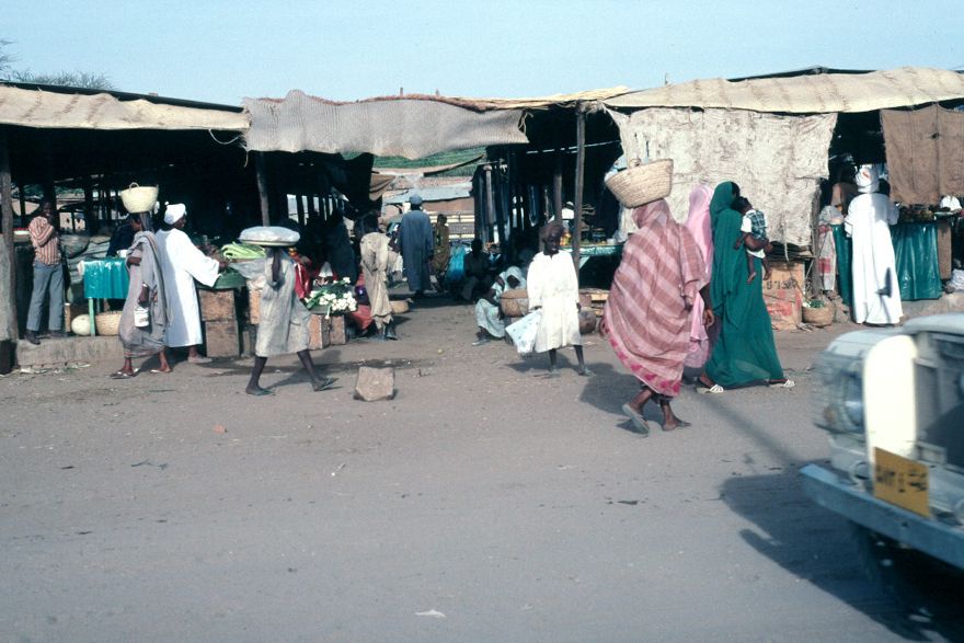 The marketplace in El Obeid, on the north side of the Nuba Mountains. Despite a range of vegetables, the staples are sorghum mush and a slip