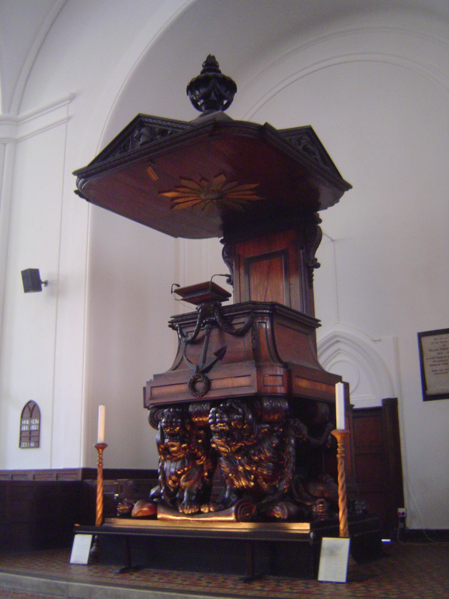 The pulpit, made of timber from India, is by Anreith, 1779. It stayed in place, covered up, when the building was rebuilt around it.