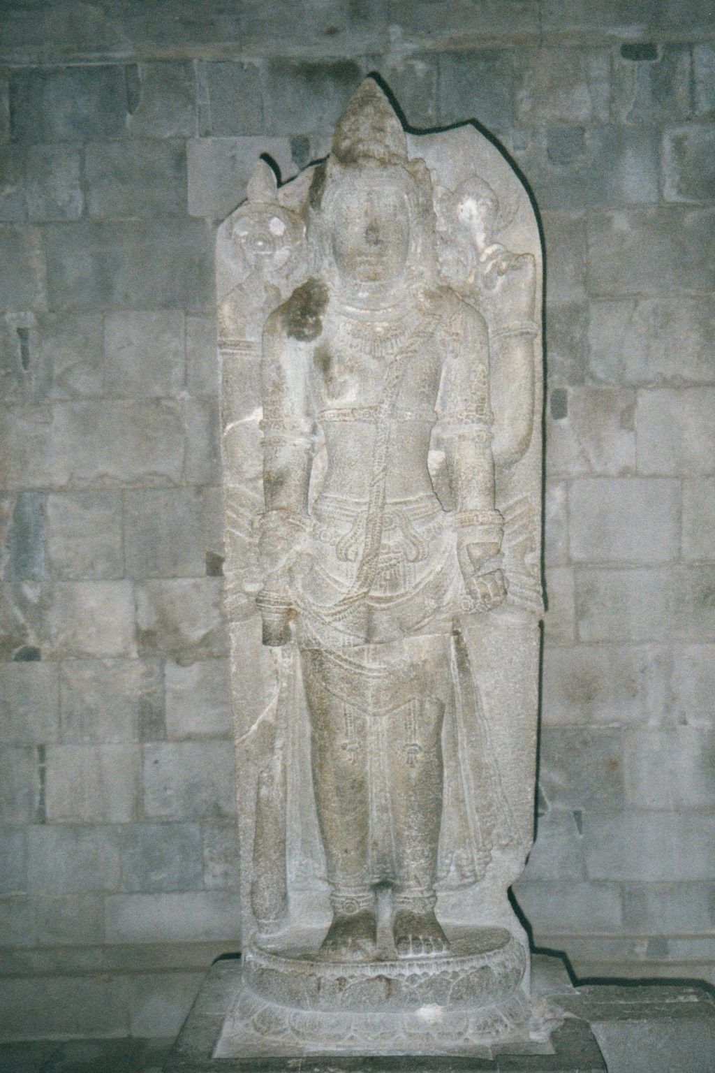 Inside the Shiva temple, Shiva is shown in human form and standing on a lotus, an unusual combination but a reminder of the co-existence her