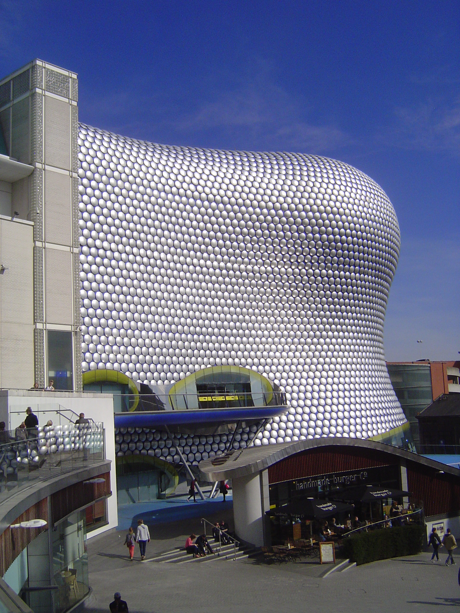 Enter Selfridge's, by Future Systems, 2001-3. Foster writes, "It is an appalling neighbour, because of its overwhelming bulk" p. 88.