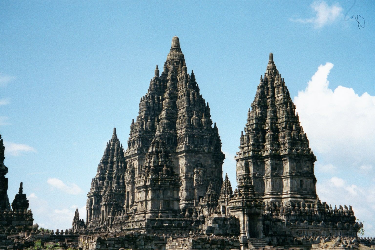 Shiva Mahadeva is flanked by smaller temples to Brahma and Vishnu. Unlike Borobudur, which invites climbers, these temples keep pilgrims at