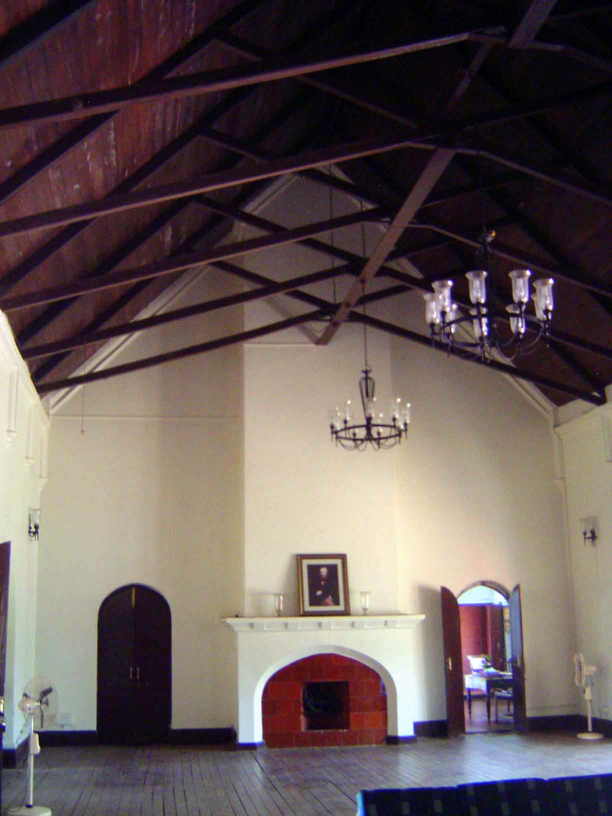 Interior of Bartle Hall. Bartle Frere, Governor of Bombay in the flush 1860s, leans against the mantlepiece. As Commissioner of Sind in the