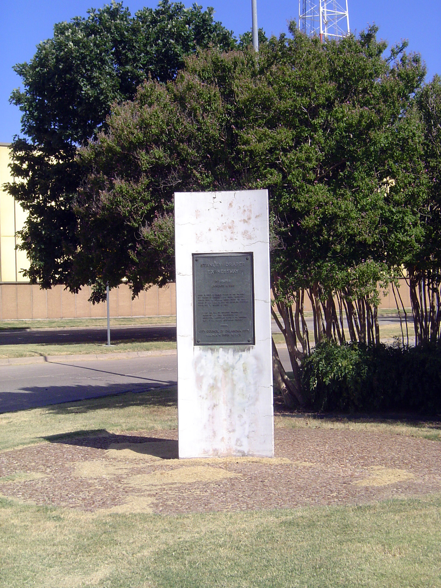 The statue has been moved, though as of 2012 the monument survives.