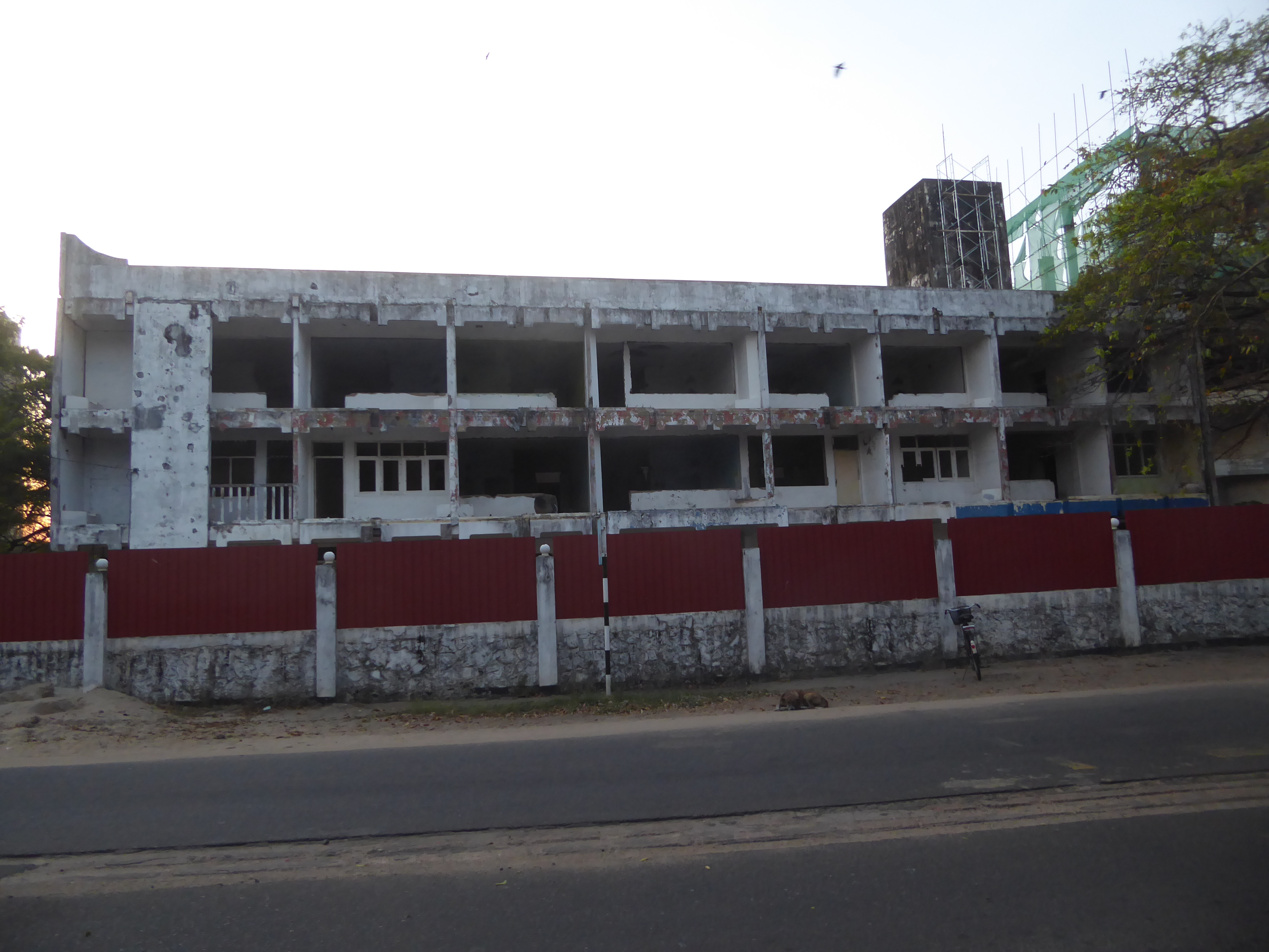 And here, even closer to the Jetwing hotel, is the wreckage of the Subhas Tourist Hotel. It faces its onetime rival, the Hotel Ashok, which