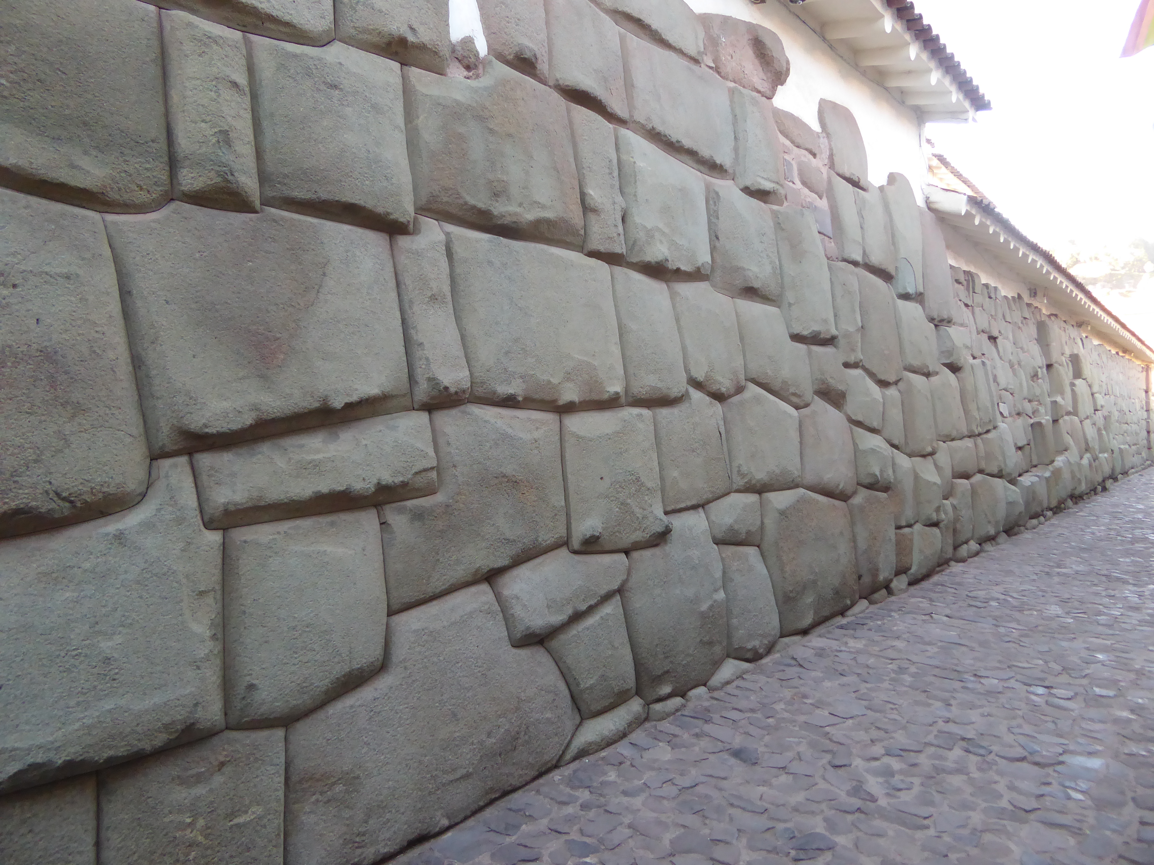 Think the masons couldn't have built a precisely coursed wall?