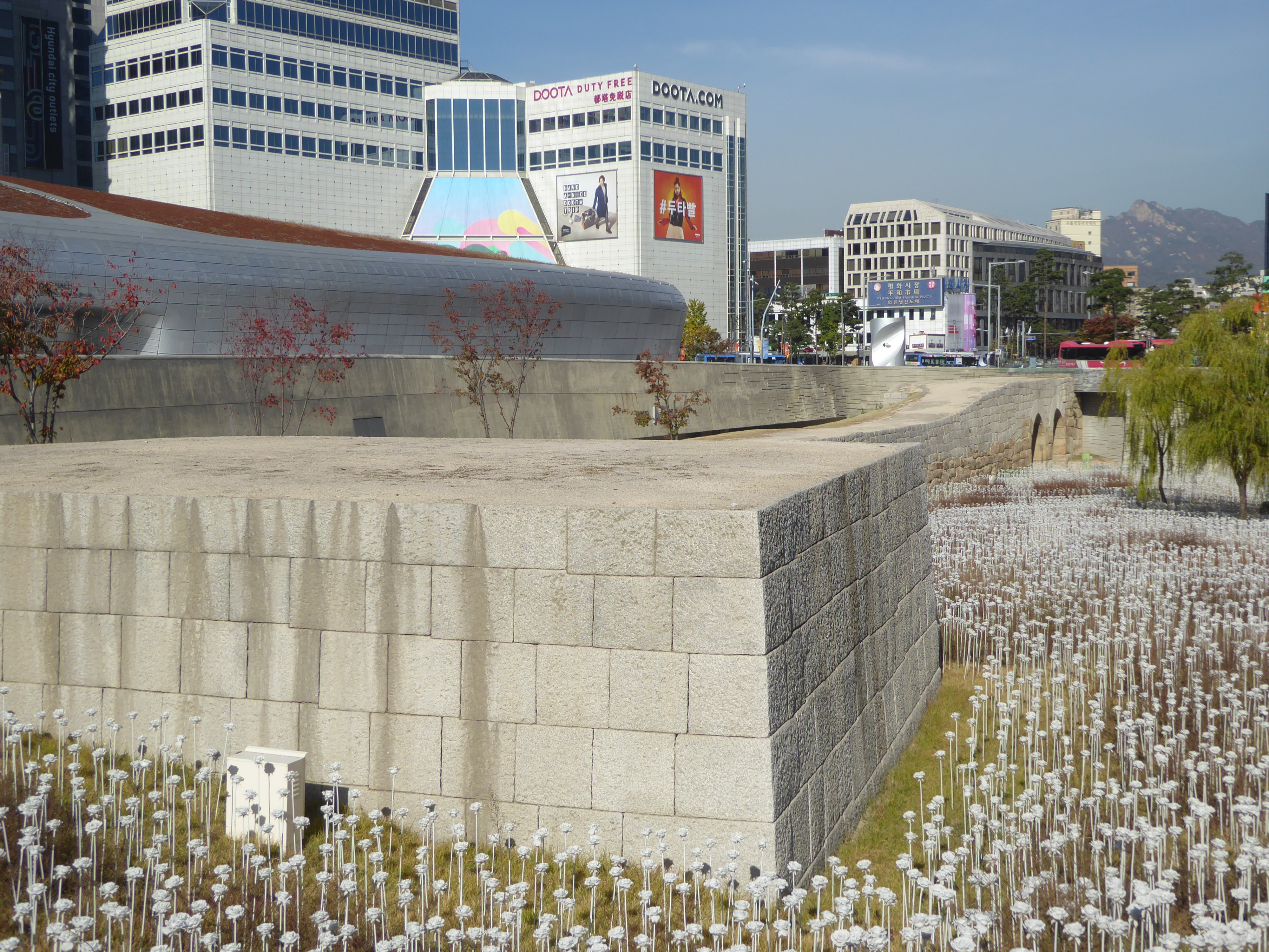 Just to the south of the gate, the Japanese converted part of the wall into a sporting arena with an oval track. It's gone now—the Koreans a