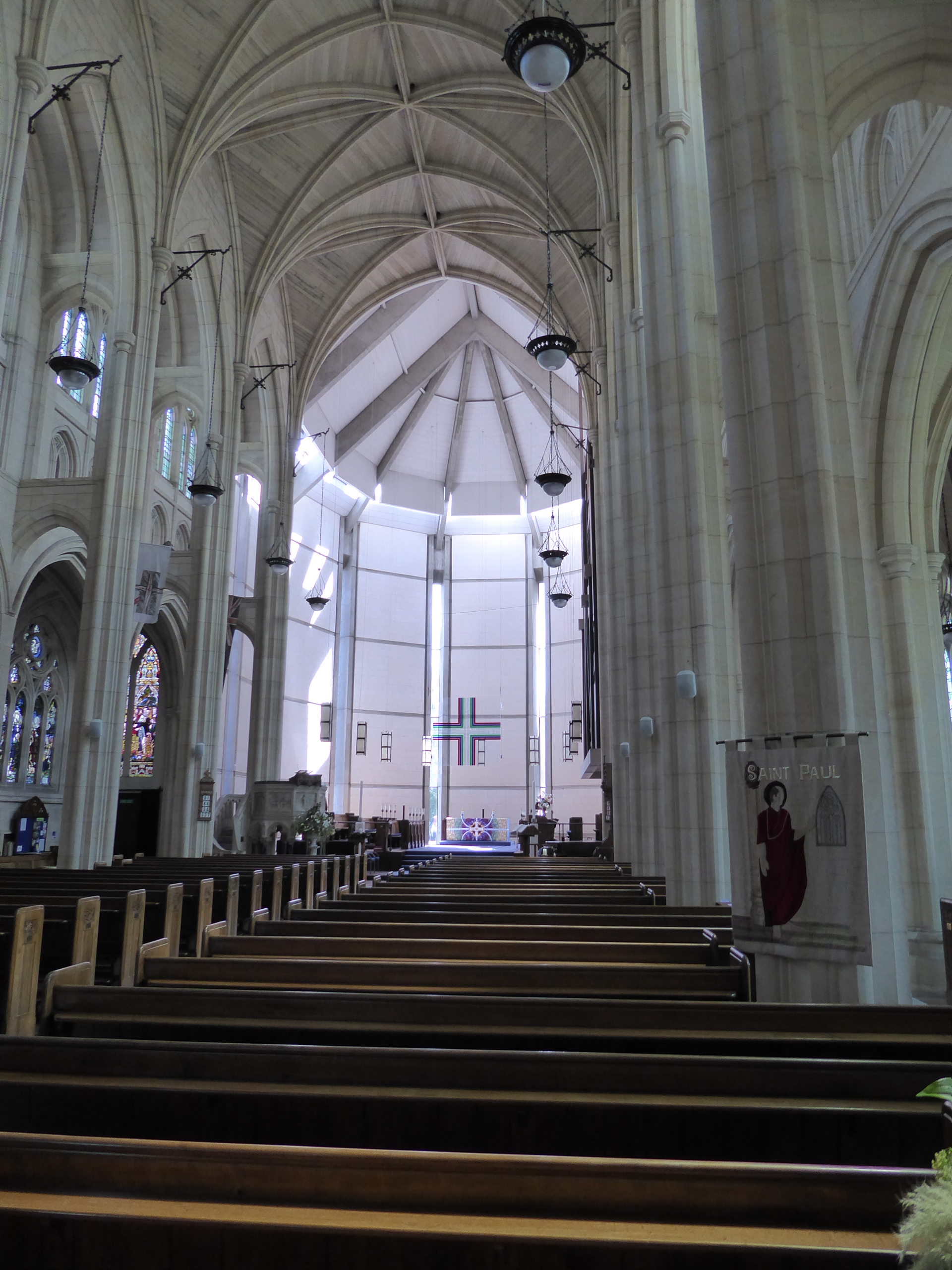 The nave is roofed with vaulted limestone; you just have to overlook the chancel, completed in 1971 with an acrylic hanging cross.