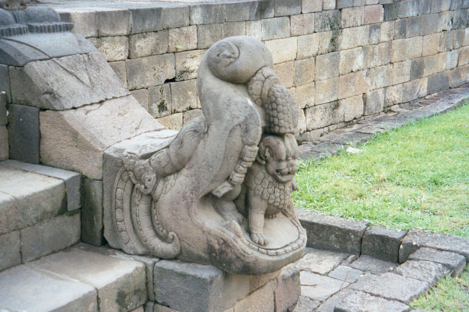 The stairs are decorated with makaras, mythical sea-monsters that disgorge other animals—in this case a lion.