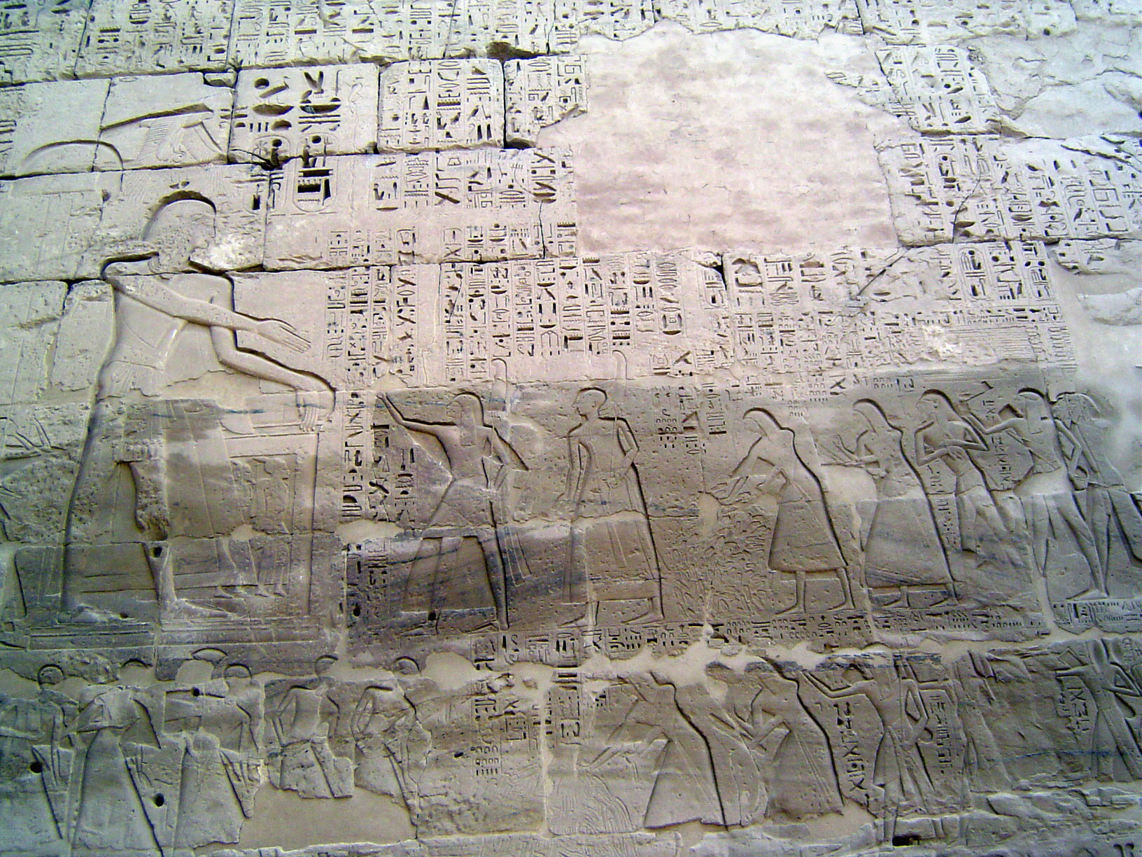An especially gory panel, with baskets of body parts offered as an accounting of enemy deaths.