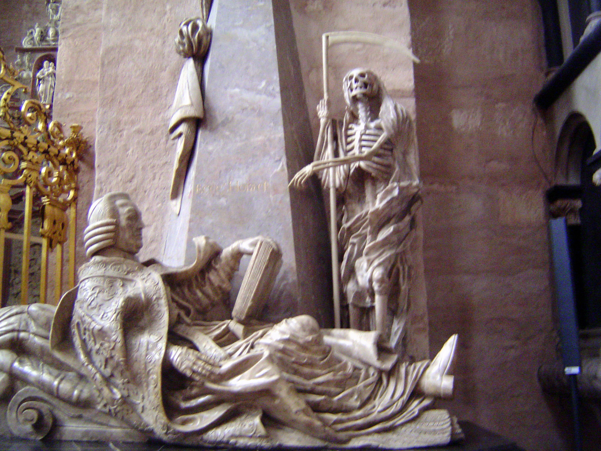 Momento mori: a skeleton in the cathedral mocks the living.
