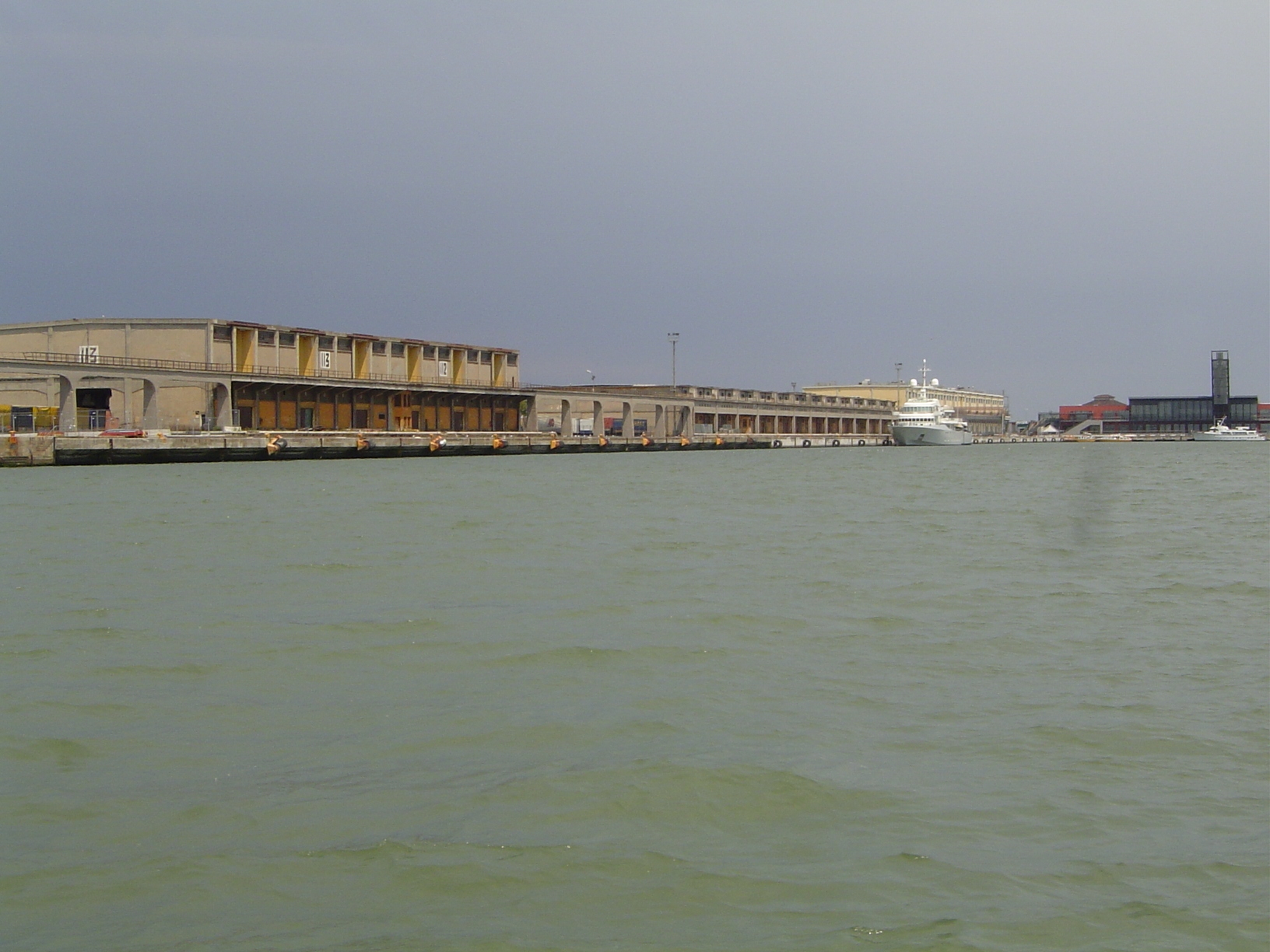 Freighters start at the city's western edge, too. Some load up here, at a deep-water dock near the parking garages. The first of these moder