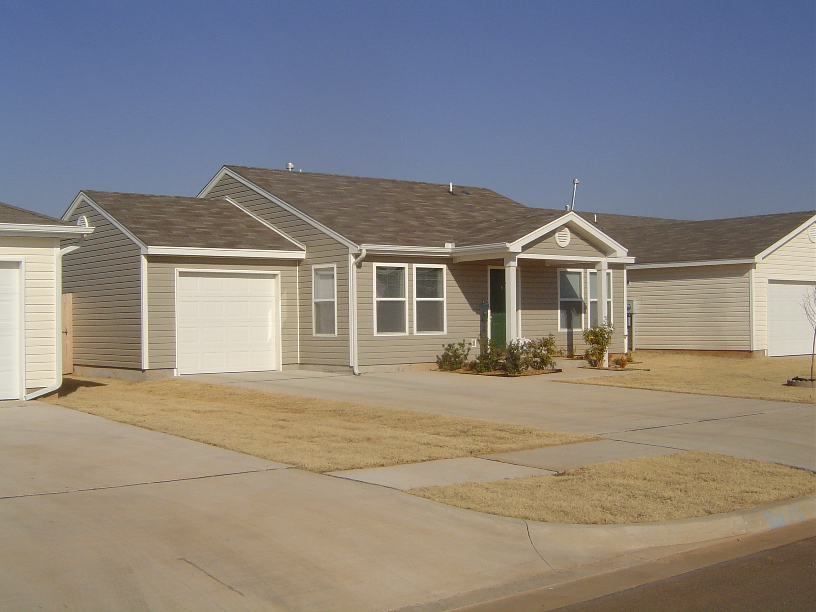 The houses run about 800 square feet and cost—Norman's high for Oklahoma—about $90,000.