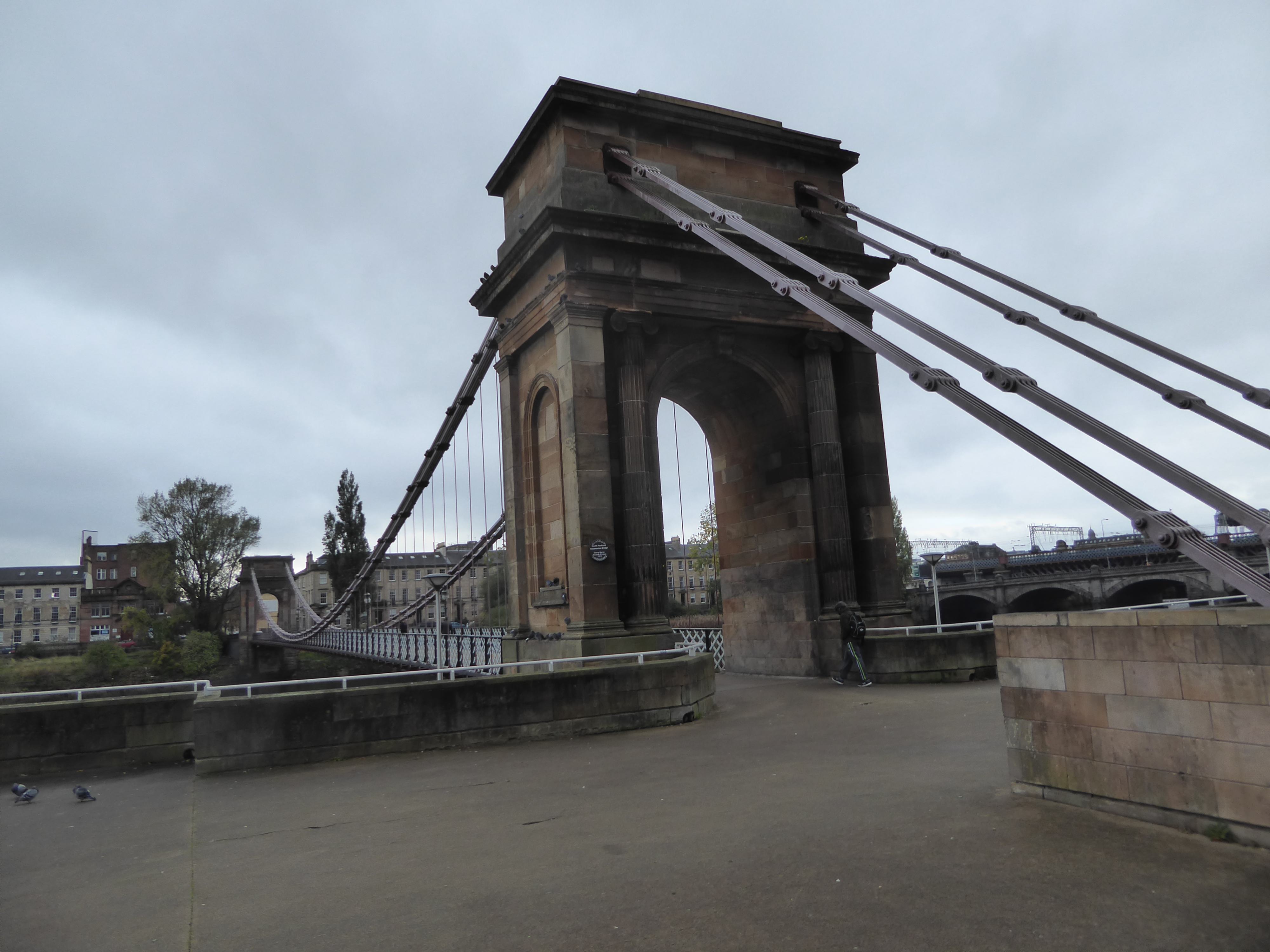 It's the Portland Street Suspension Bridge or simply the Clyde Suspension Bridge, a financial disaster for the promoters who hoped on comple