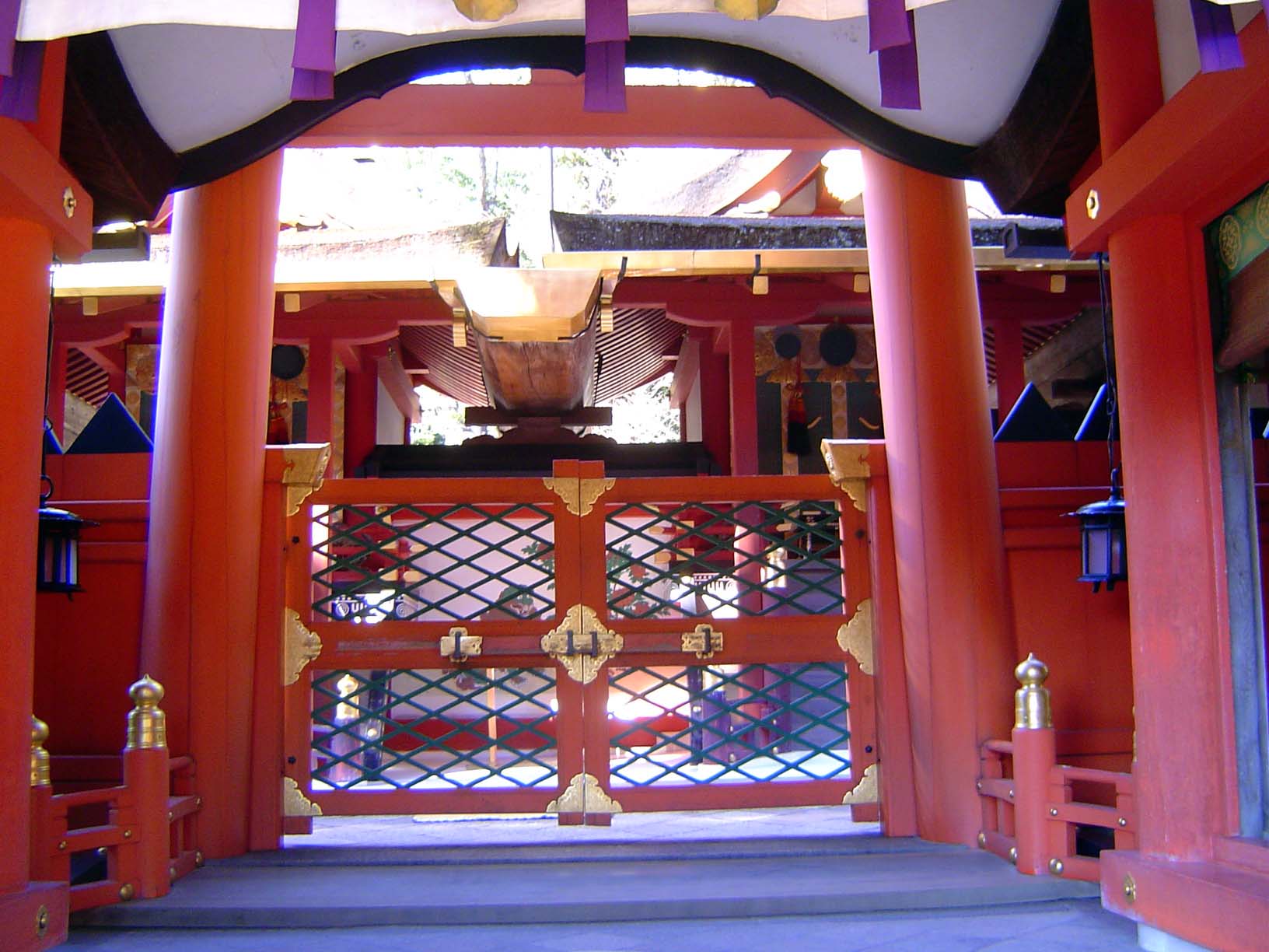 They're behind the closed gate: two of the four are visible here, right and left, like small but ornate sheds.