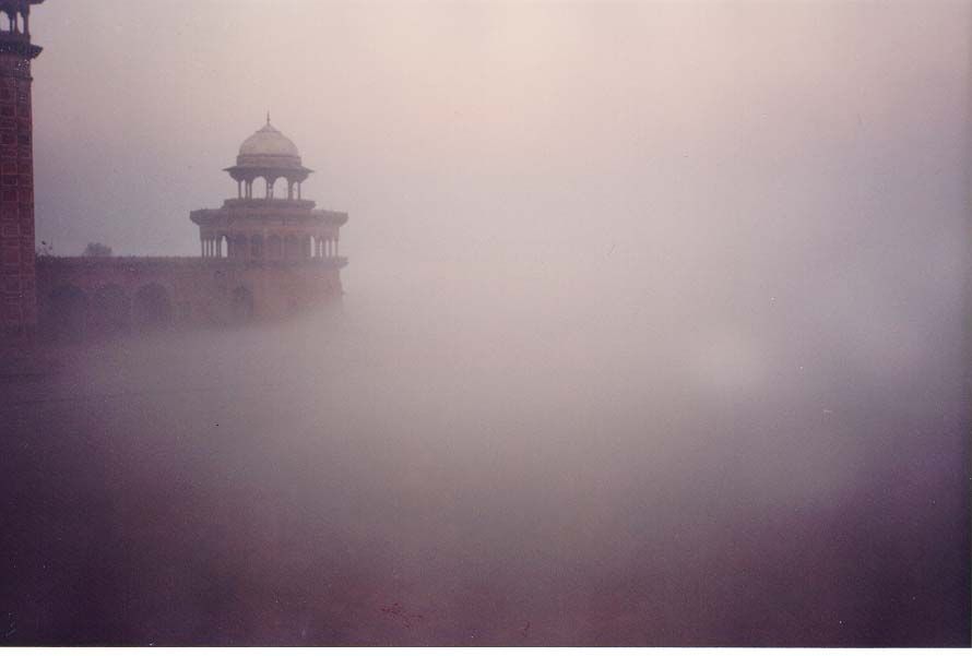 Early morning fogs drift in from the Yamuna River, just a few meters behind the Taj. Access to the Taj was originally by boat, not the land