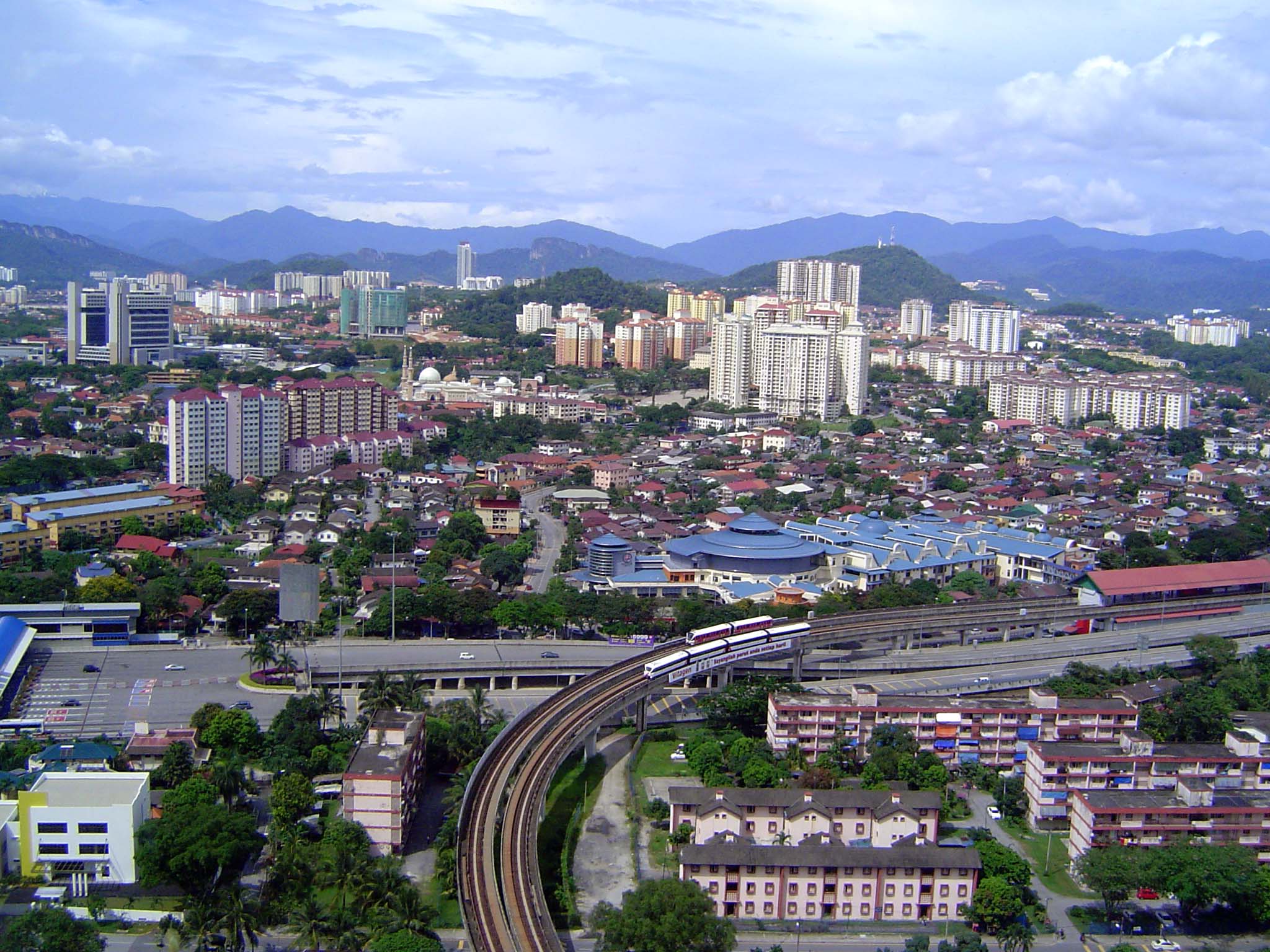 In the years since then, the city has grown amazingly. The view east from Ampang Park looks like an imaginary city in an advertisement paid