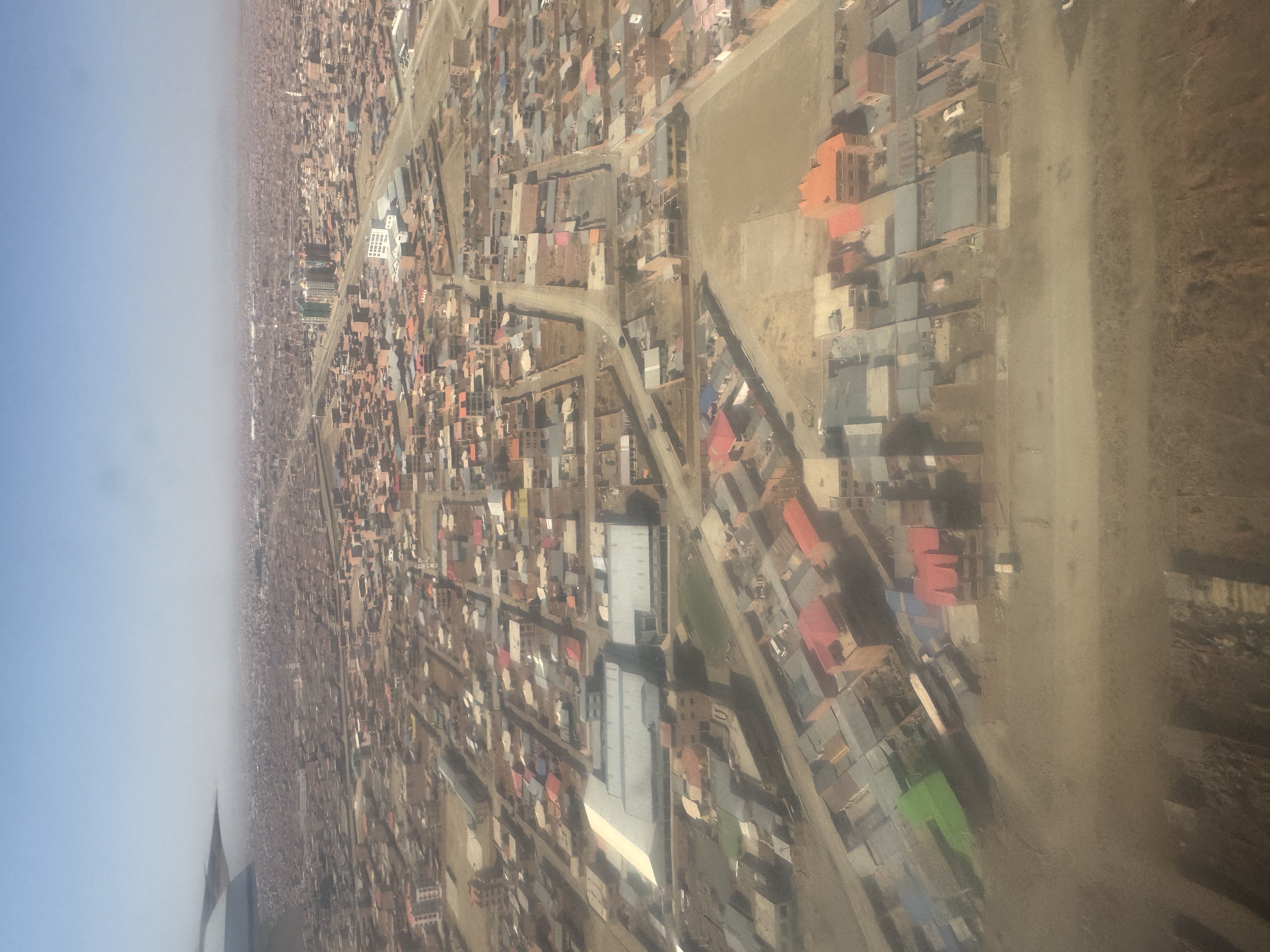 Ah!  Here we are, about to land at El Alto, the name of a town as well as of La Paz's airport.  It's dead flat up here but more than two mil