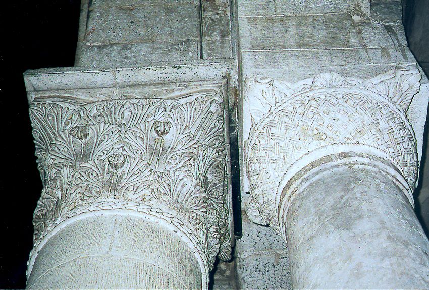 The column on the right is older and supports the Byzantine courtyard adjoining the rotunda; the column on the left supports the 12th centur