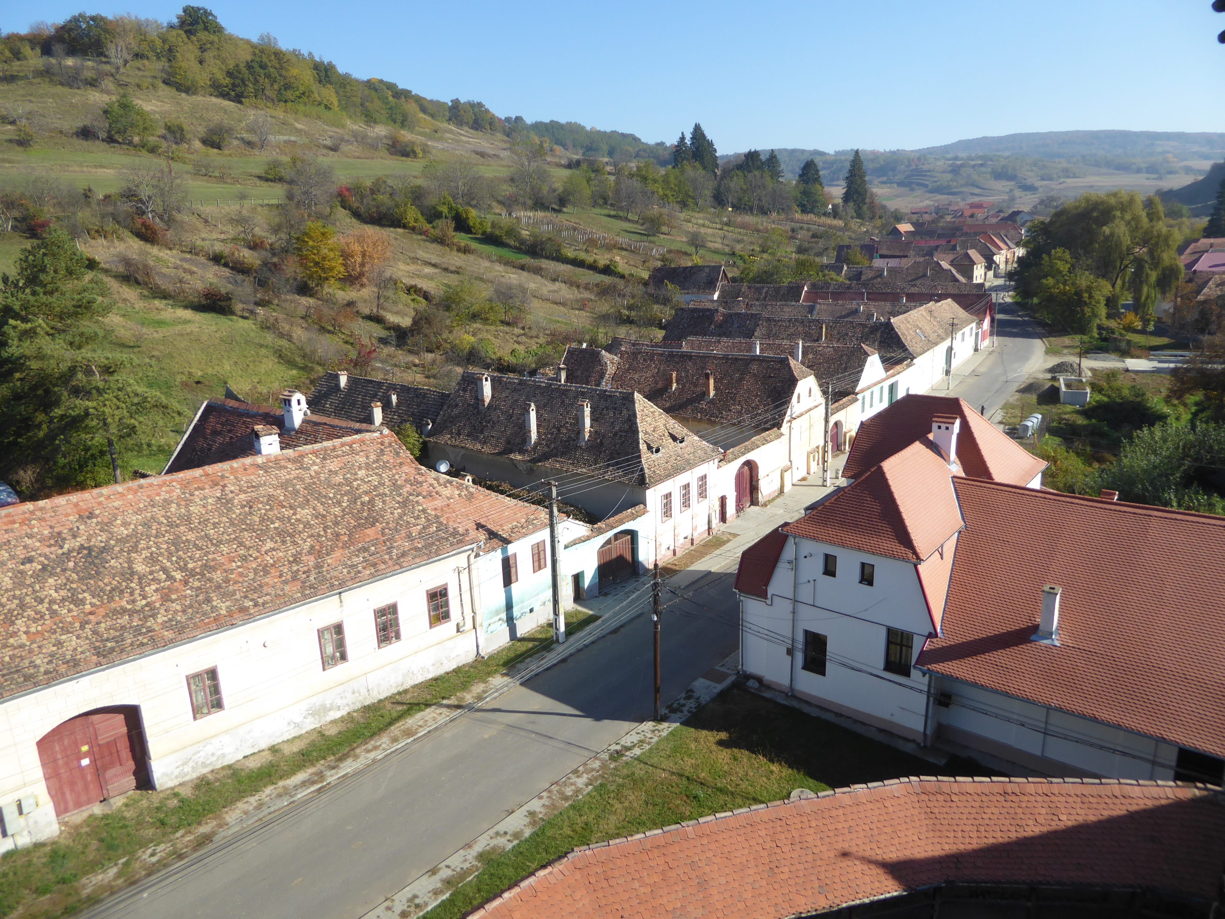 Another view up the tributary valley. That's a cemetery on a mid-distance slope. The view also gives a good idea of the typical house layout