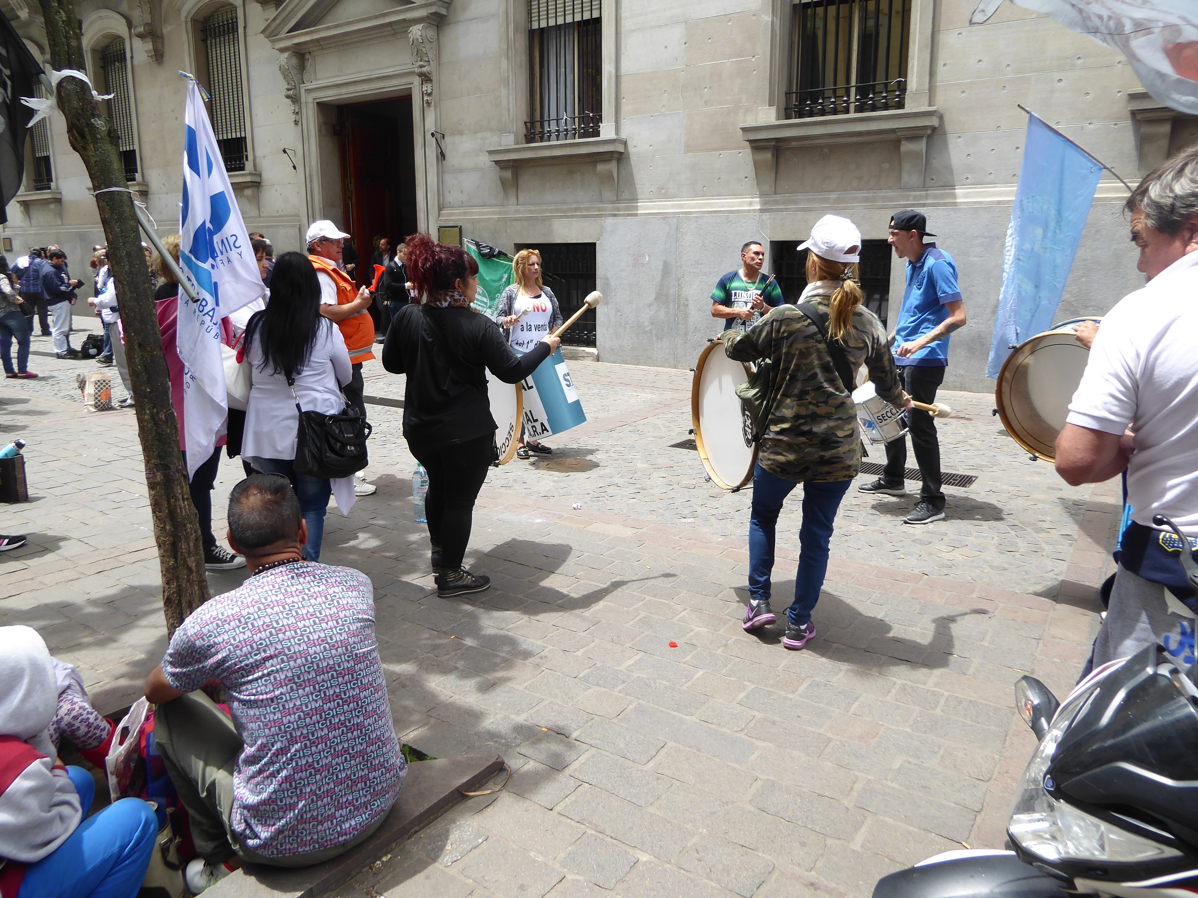 The banks attract protesters who, especially with that little pink compressed-air horn, make an amazing amount of noise.