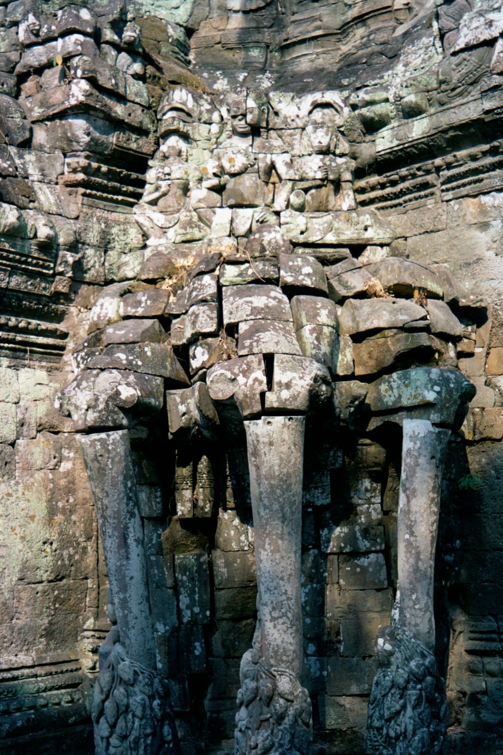The stones on the East Gate are spreading, but the triple-headed elephant still plucks lotus flowers from the moat.