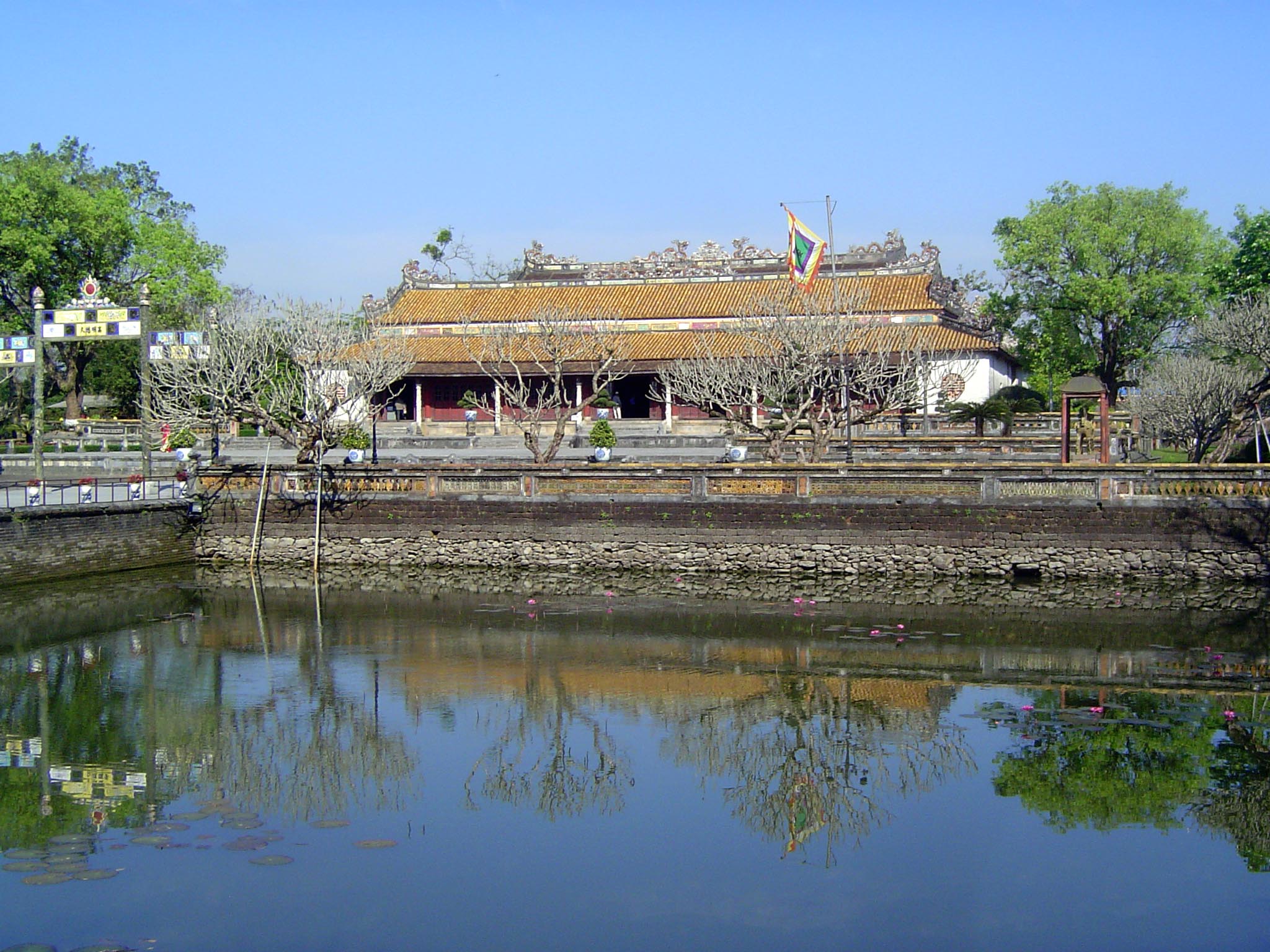 Inside the gate of the Imperial City, the view is north across the Thai Dich Lake to the Hall of Supreme Harmony or Thai Hoa Palace.