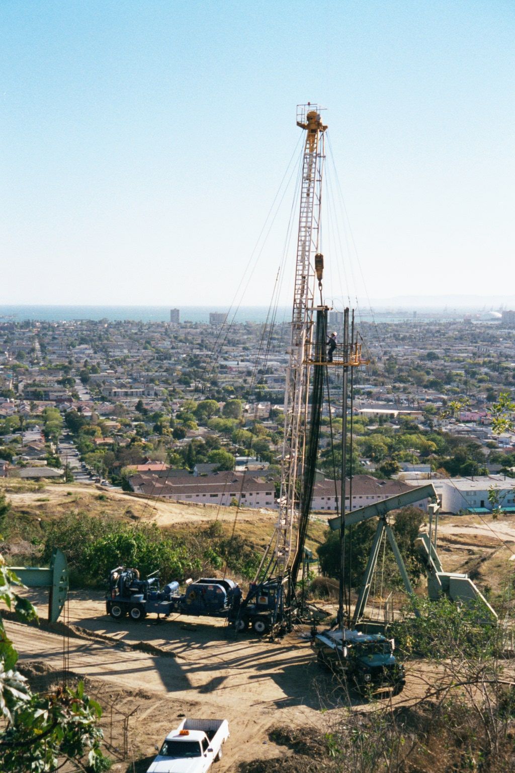 Three miles to the south is Signal Hill. Oil was discovered here in 1922, and within a few years the hill was so covered with derricks that
