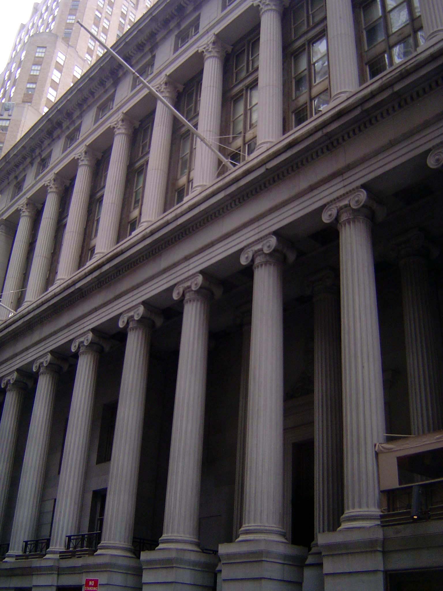 The lower columns are monoliths, unlike Federal Hall or the Parthenon, for that matter. Sixty years later, the First National Bank, which oc
