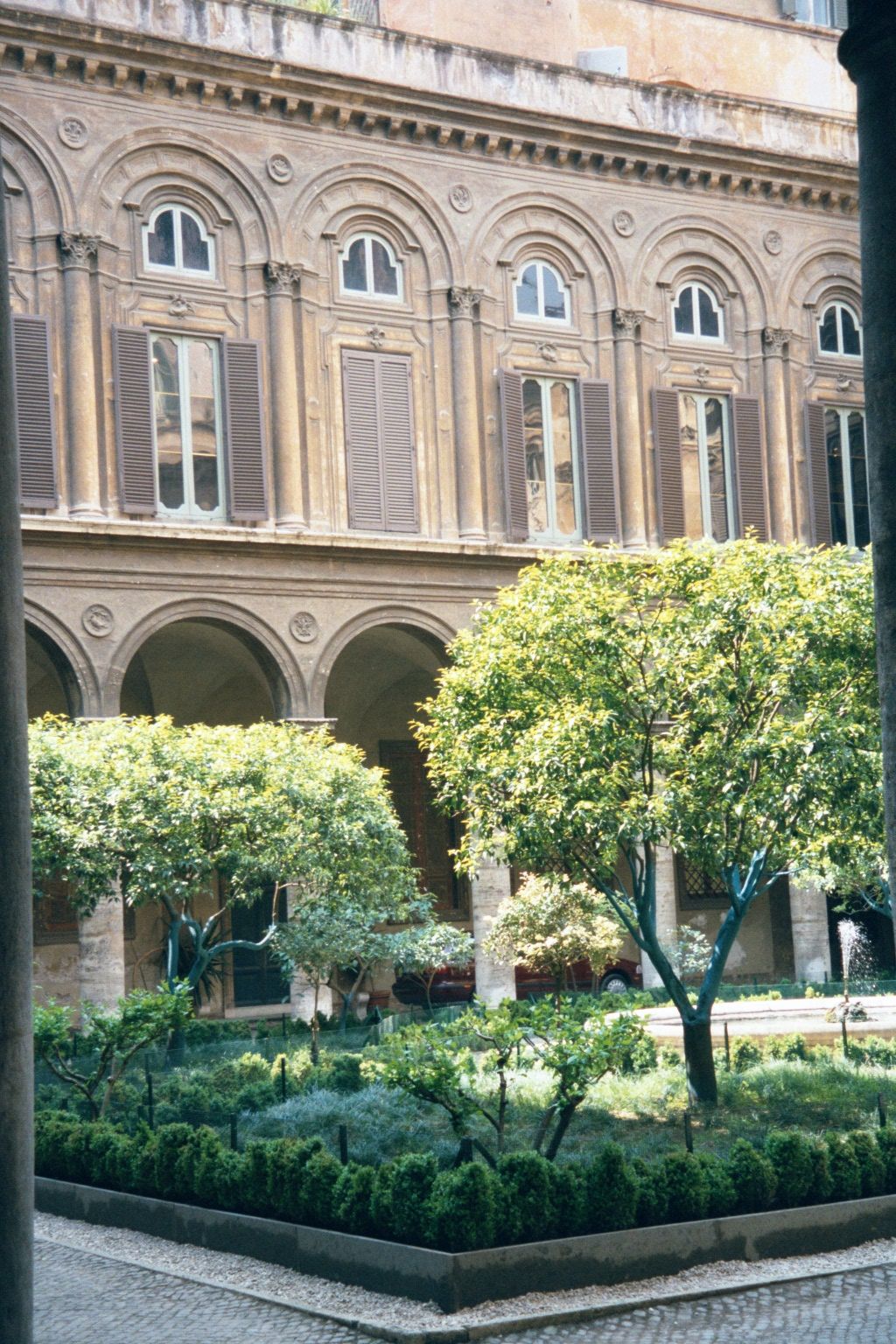 Just a few steps off the Corso, the courtyard of the Palazzo Doria Pamphilj.