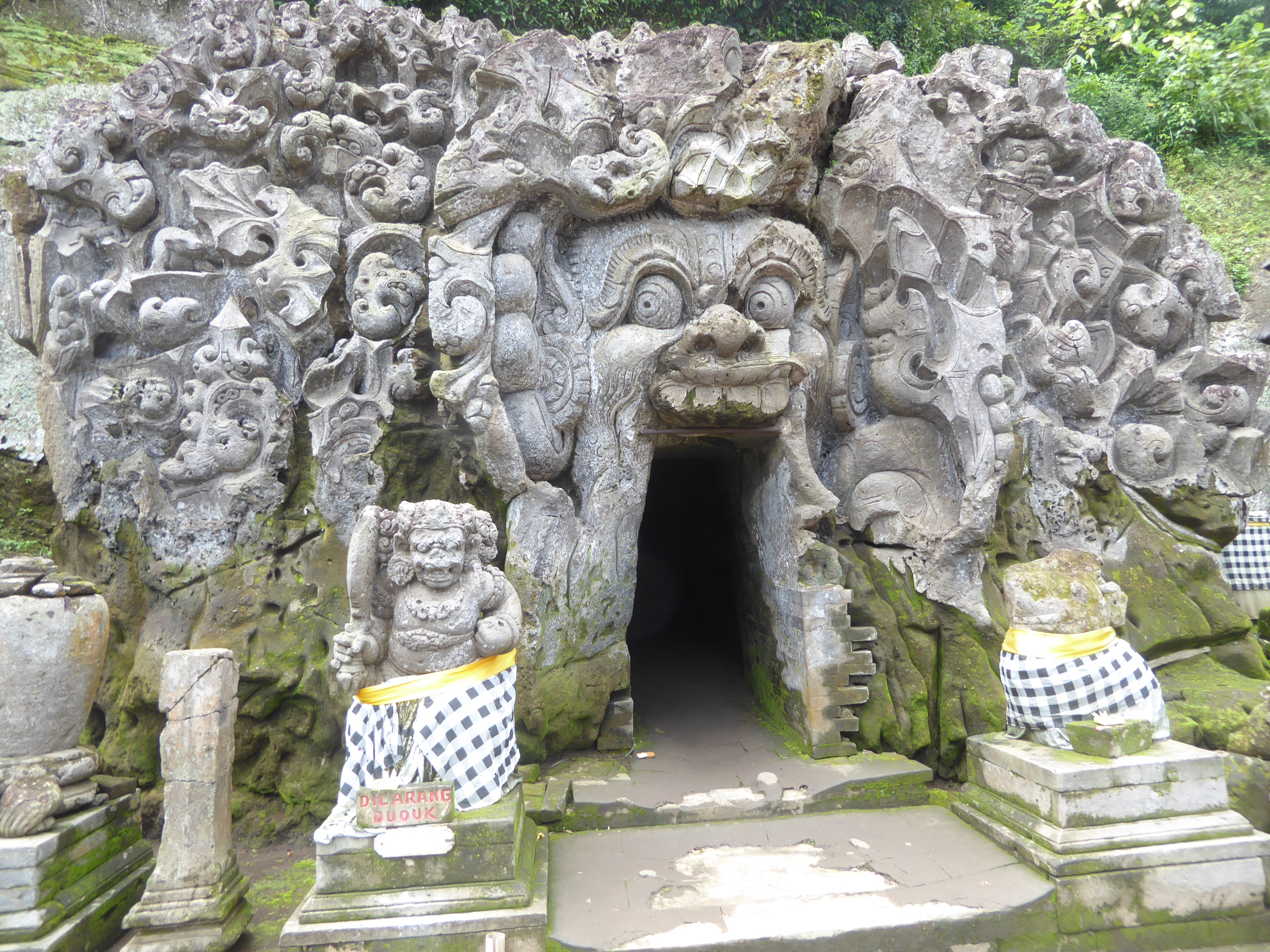 Here's a doorway that's anything but blind. Panicked nature flies away from the demonic head with its billiard-ball eyes. We're a few miles