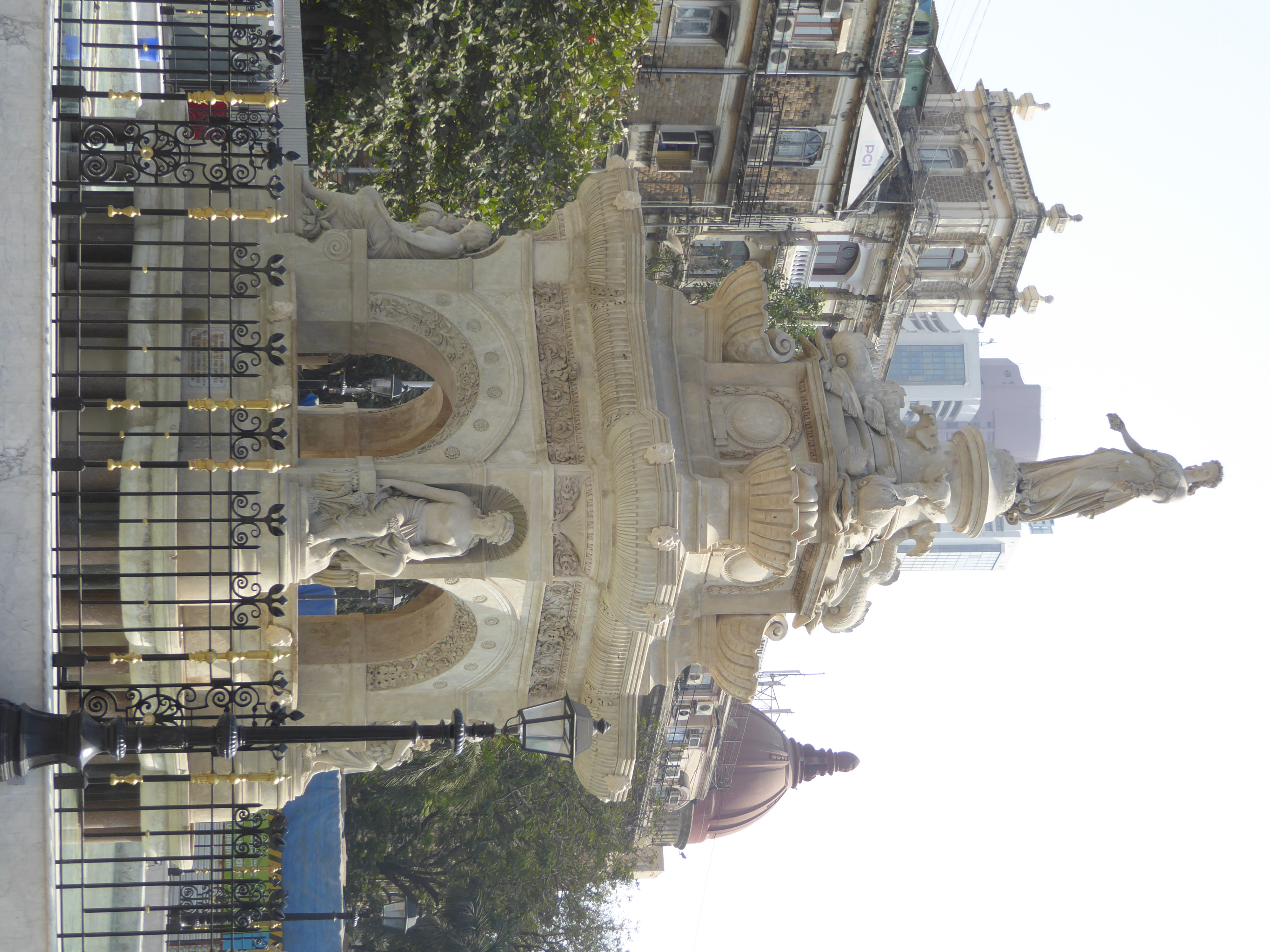 Freshly restored in 2019, the limestone is bright once again. Flora, the goddess of plenty is up top; at the lowest level, four women repres