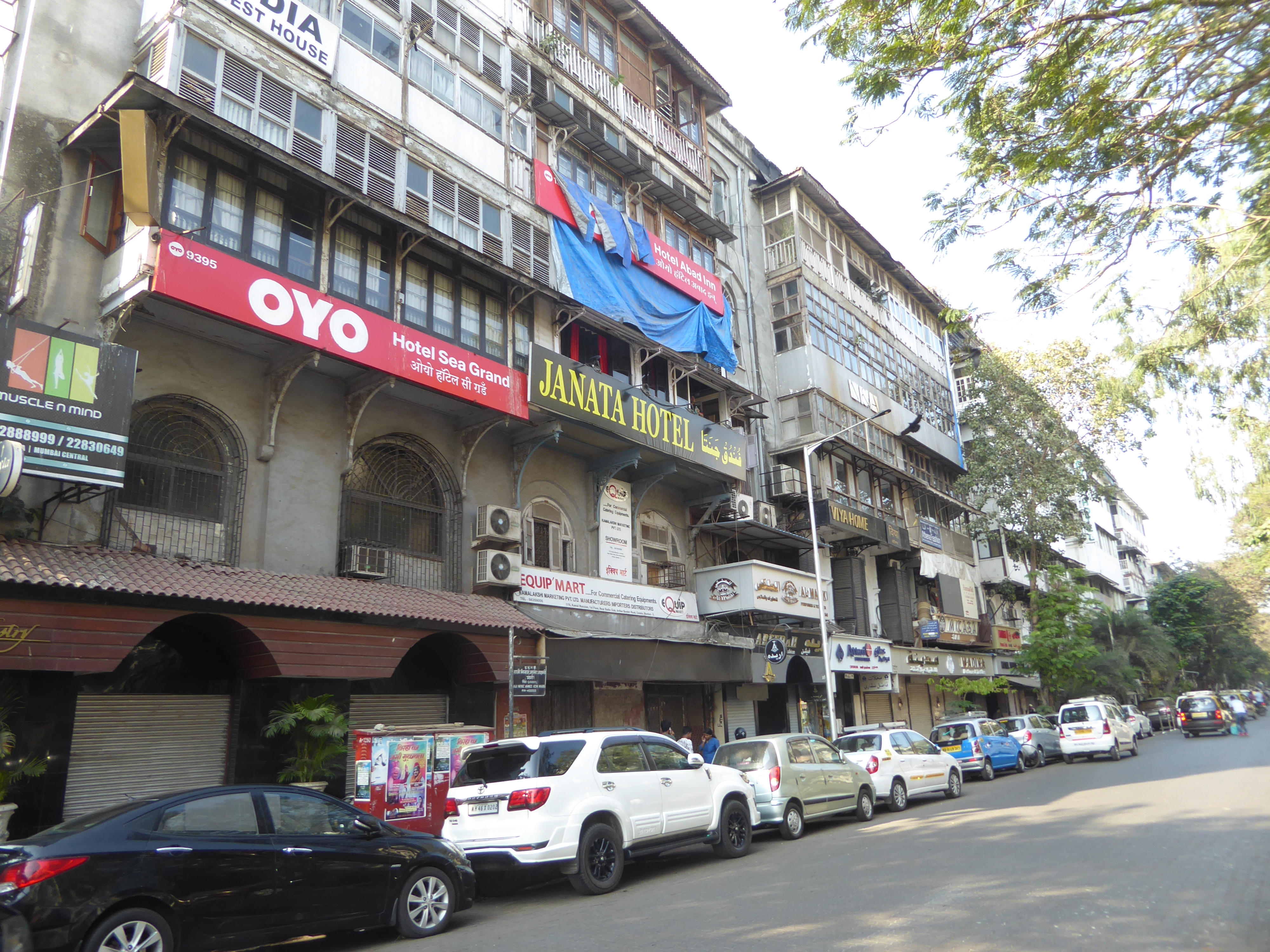 We're pushing south though Colaba. It must be very early in the morning, because the street almost looks peaceful.
