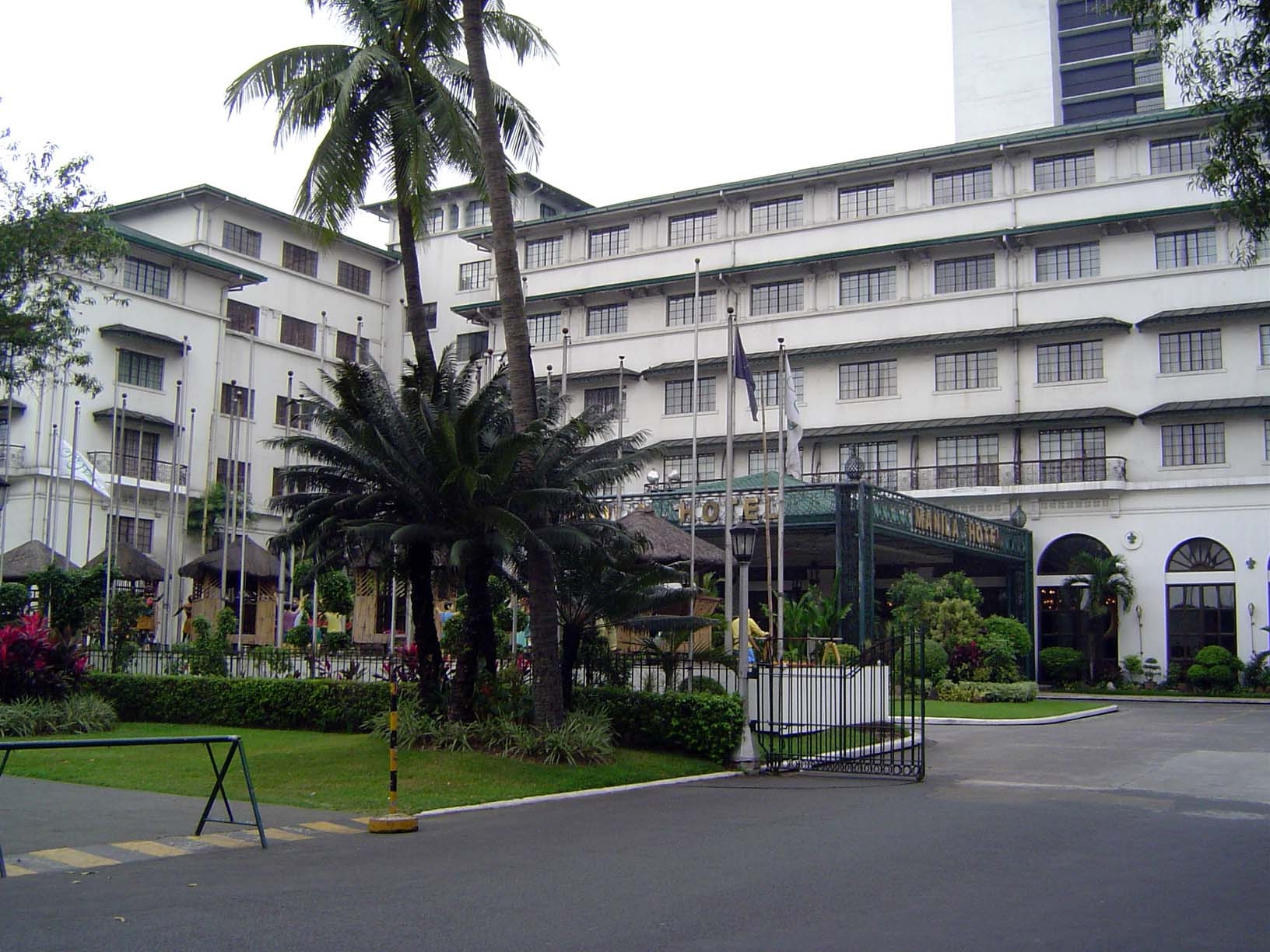 Here, however, is a survivor, remodelled but not reconstructed. It's the Manila Hotel, the city's first luxury hotel. It stands on filled la