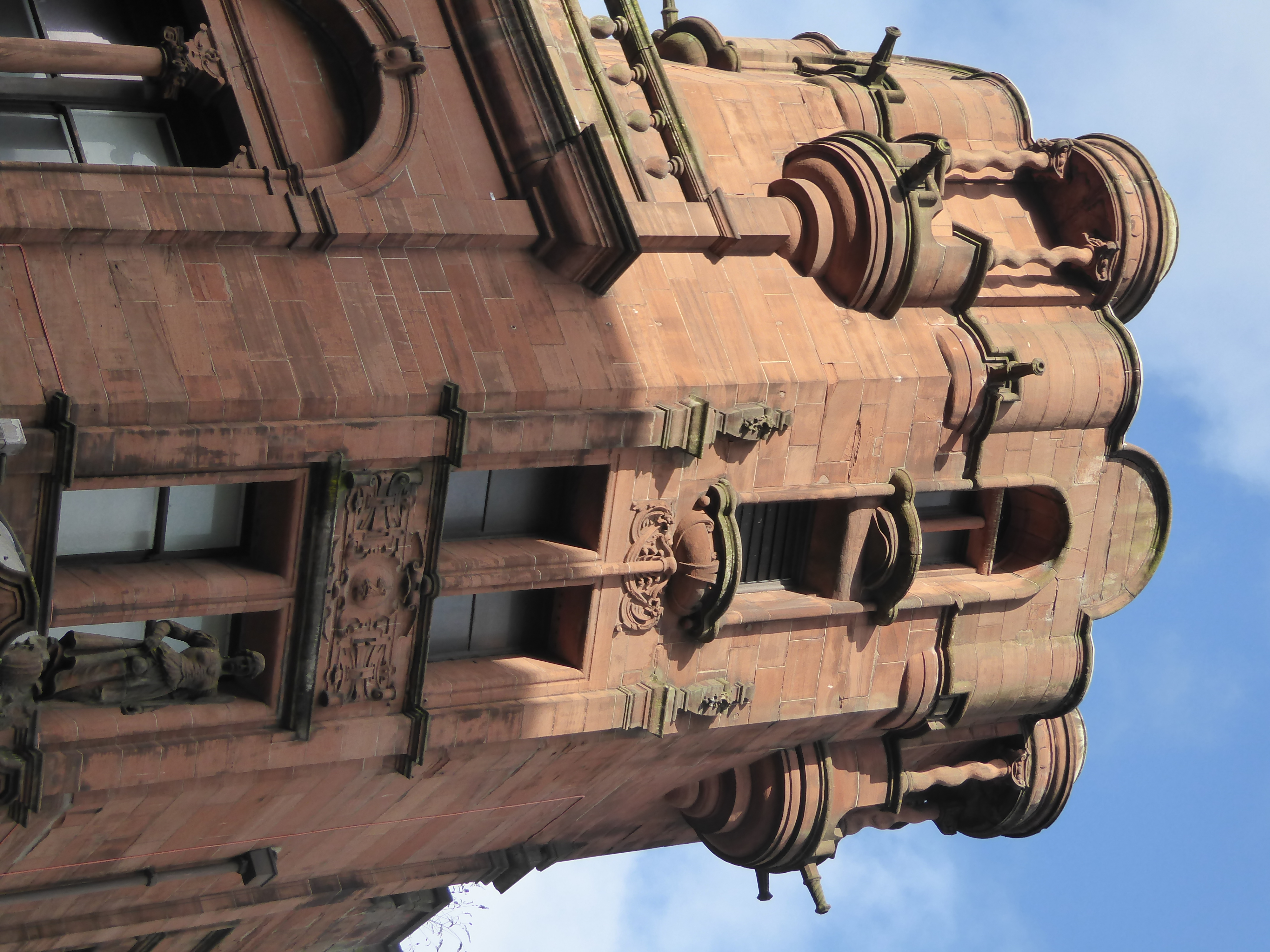 The baldacchini never got the intended statues of the four seasons, but the corner of the building got what Williamson calls a highland lass