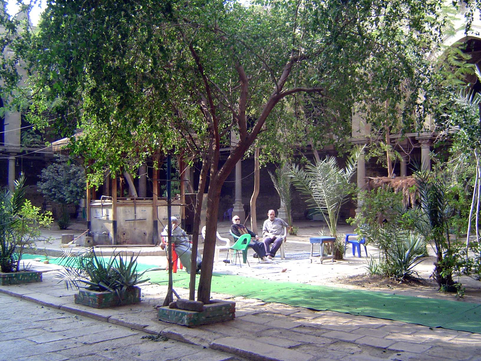 Relaxing in the courtyard. The fountain was transferred here in 1900 from the madrasa of Sultan Hasan.