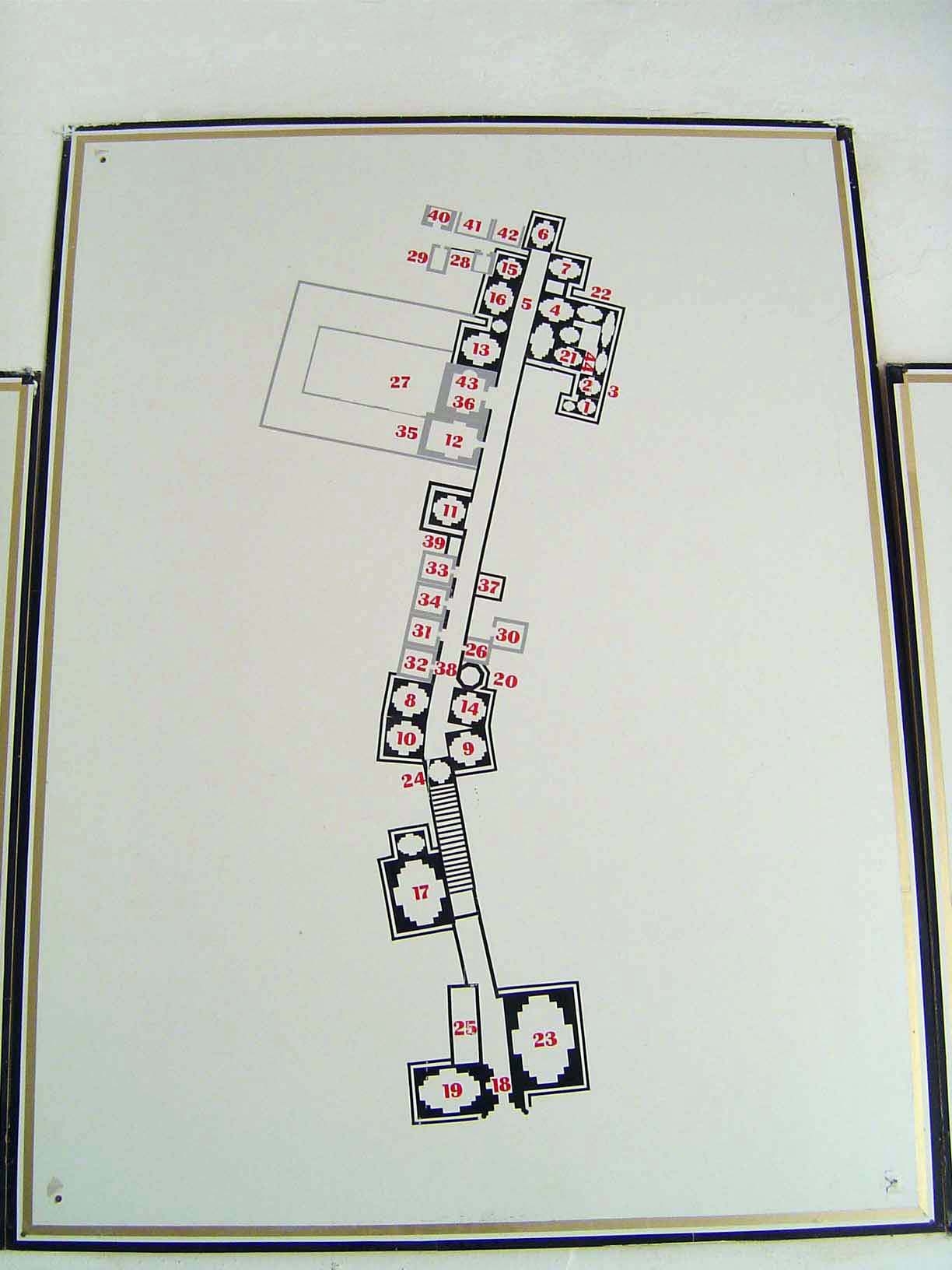 Nothing like a map. The formal entrance is at the bottom. There's a flight of stairs up to the angle where the alley turns. The large rectan