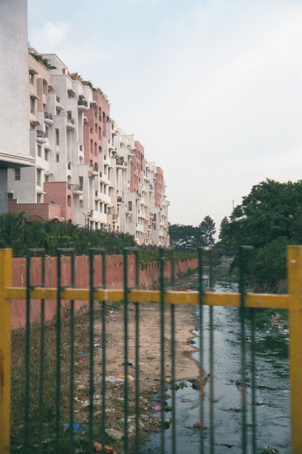 Anything unchanged from the past? How about these apartments alongside a truly foul stream.