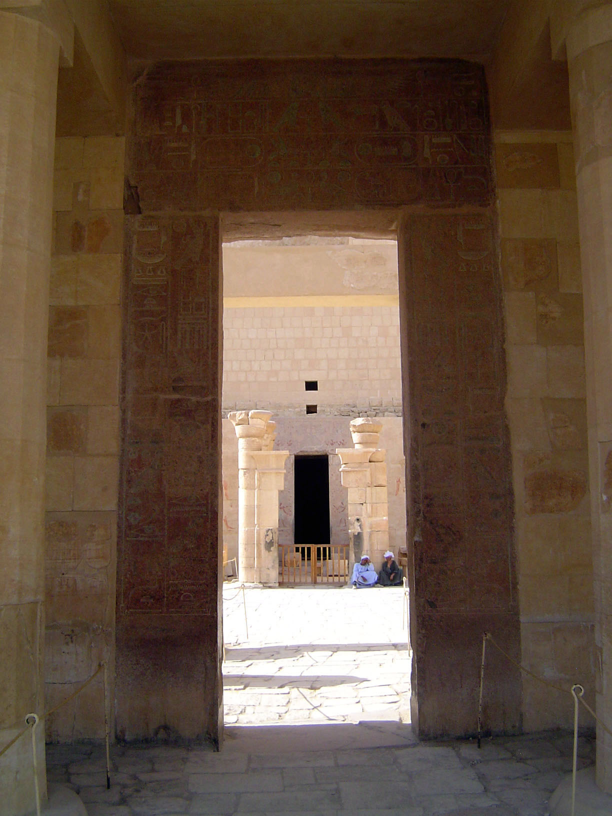 The upper colonnade has a doorway into the upper terrace and its chapel, here in the distance.