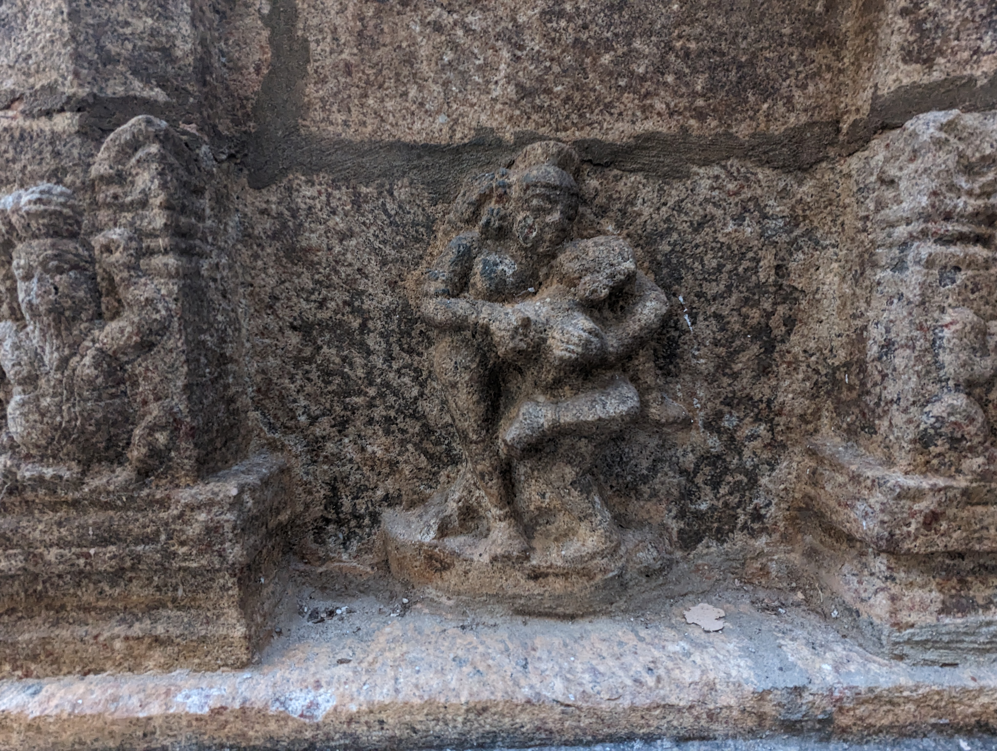Ah, a mithuna, a reminder on the temple's wall of what Stella Kramrisch calls "reintegration." So easy to forget, so hard to remember.